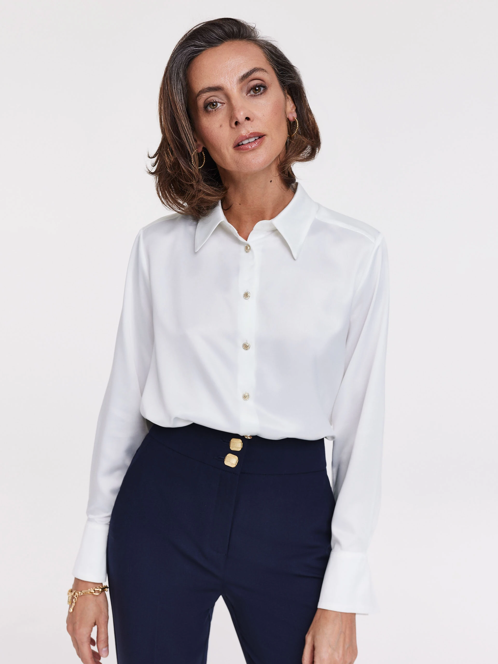White shirt with decorative buttons