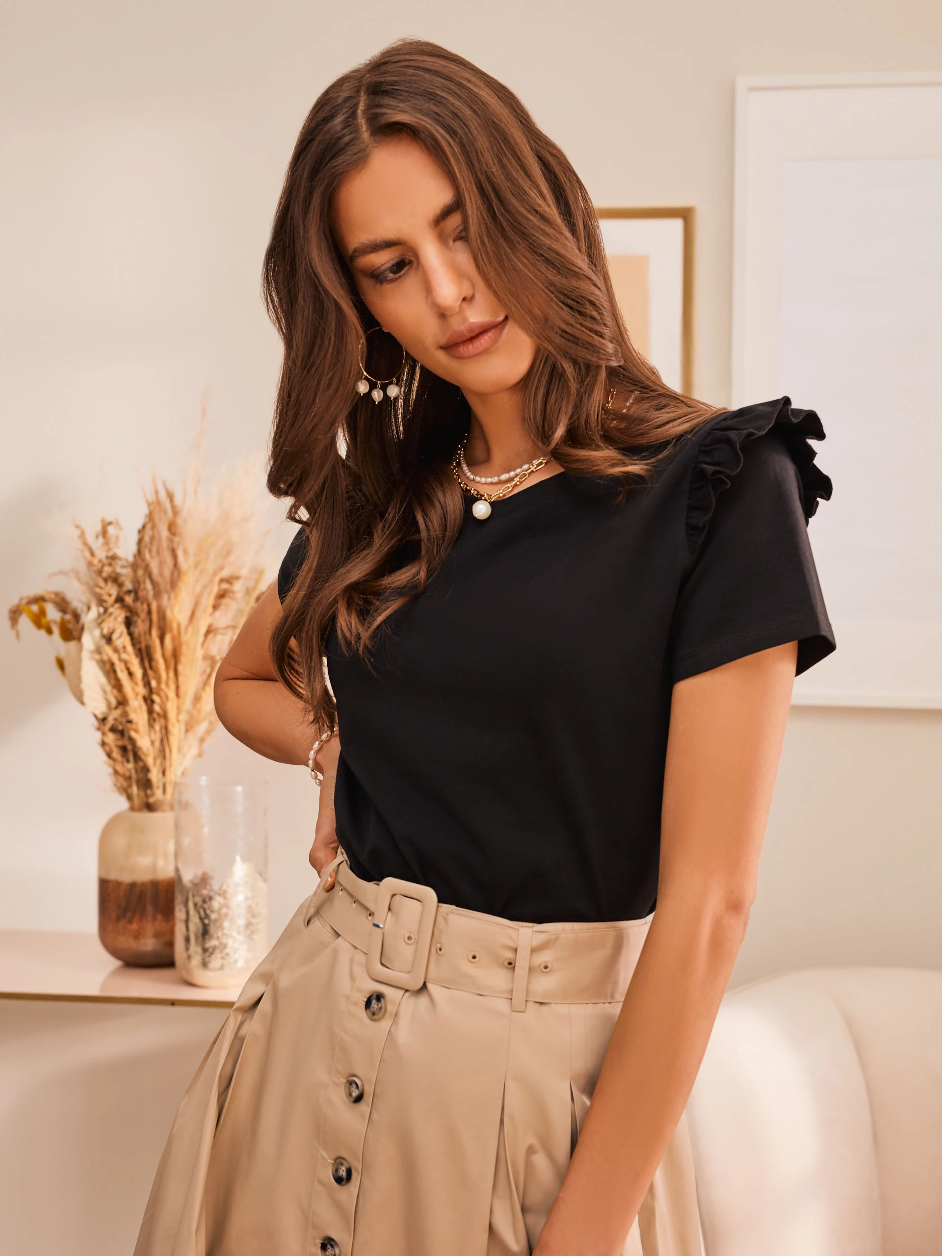 BLACK BLOUSE WITH DECORATIVE SLEEVES