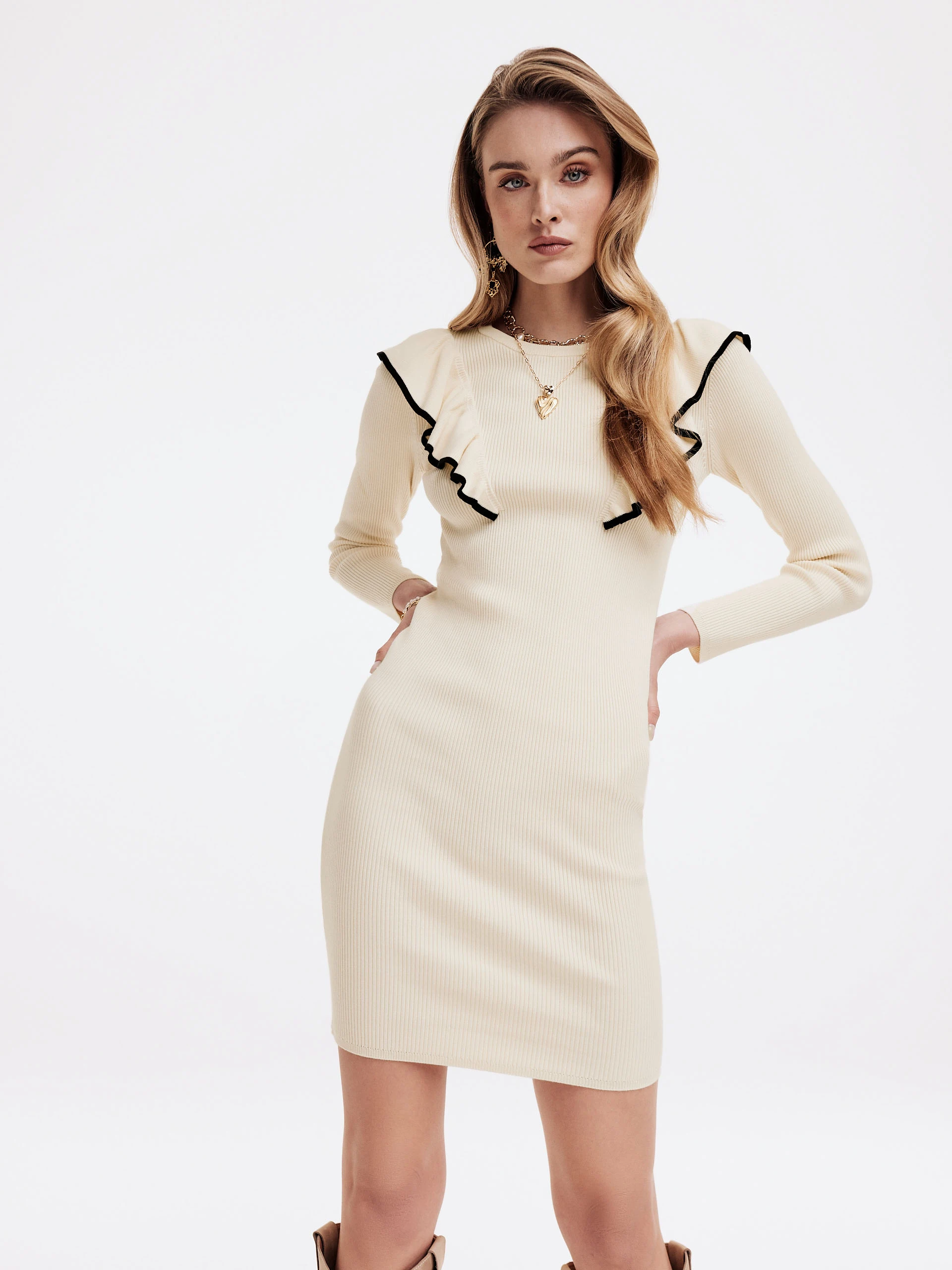 White fitted dress with ruffles