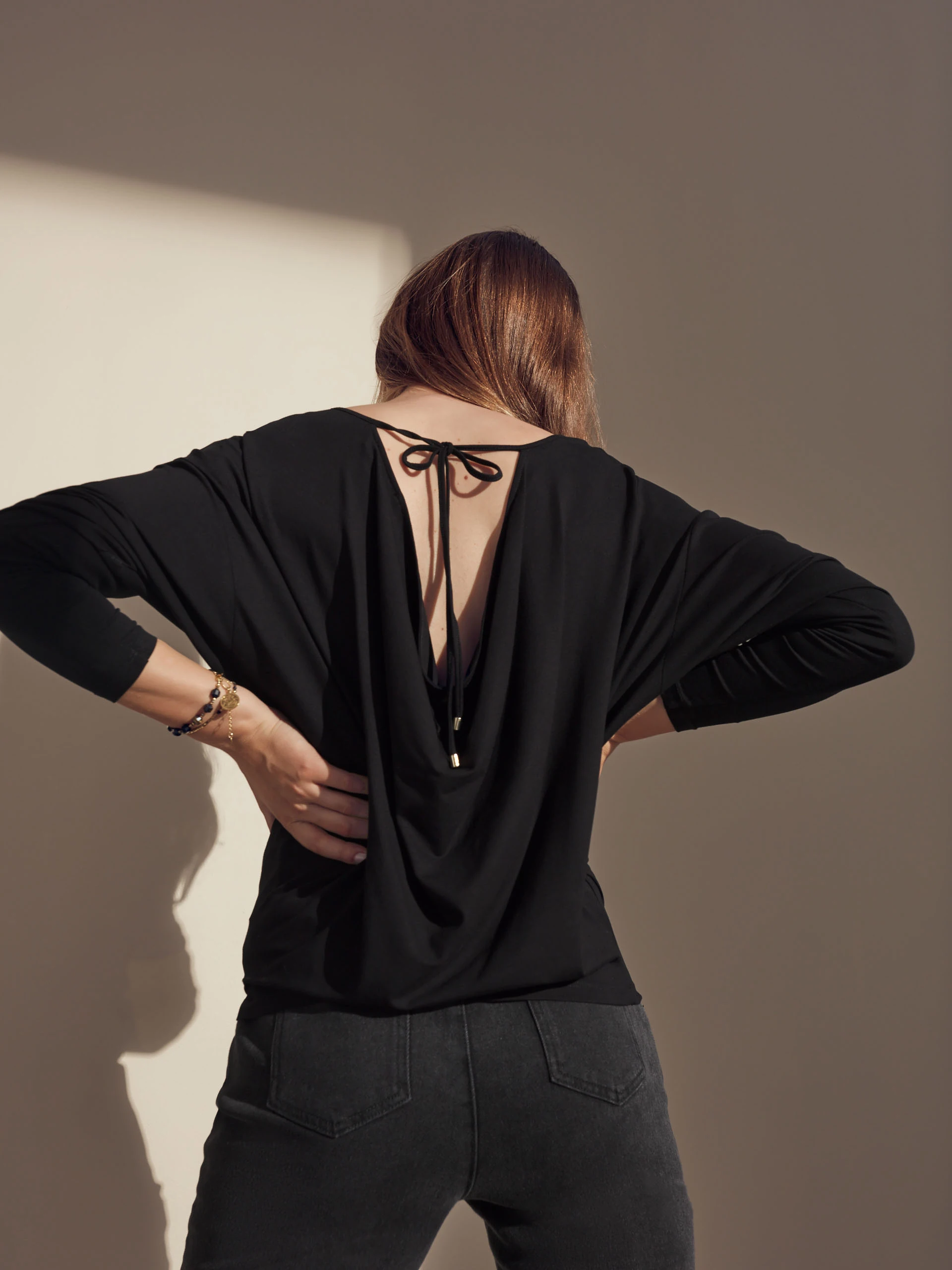 Black blouse with cut-out detail on the back
