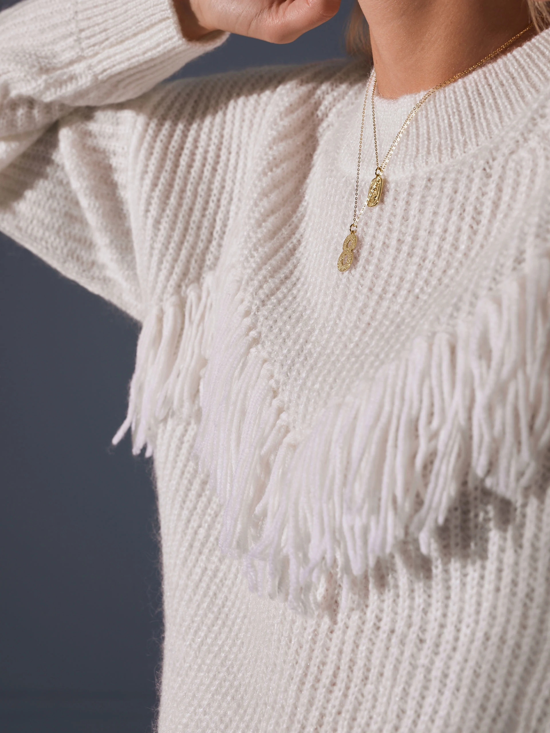 SWEATER WITH TASSELS