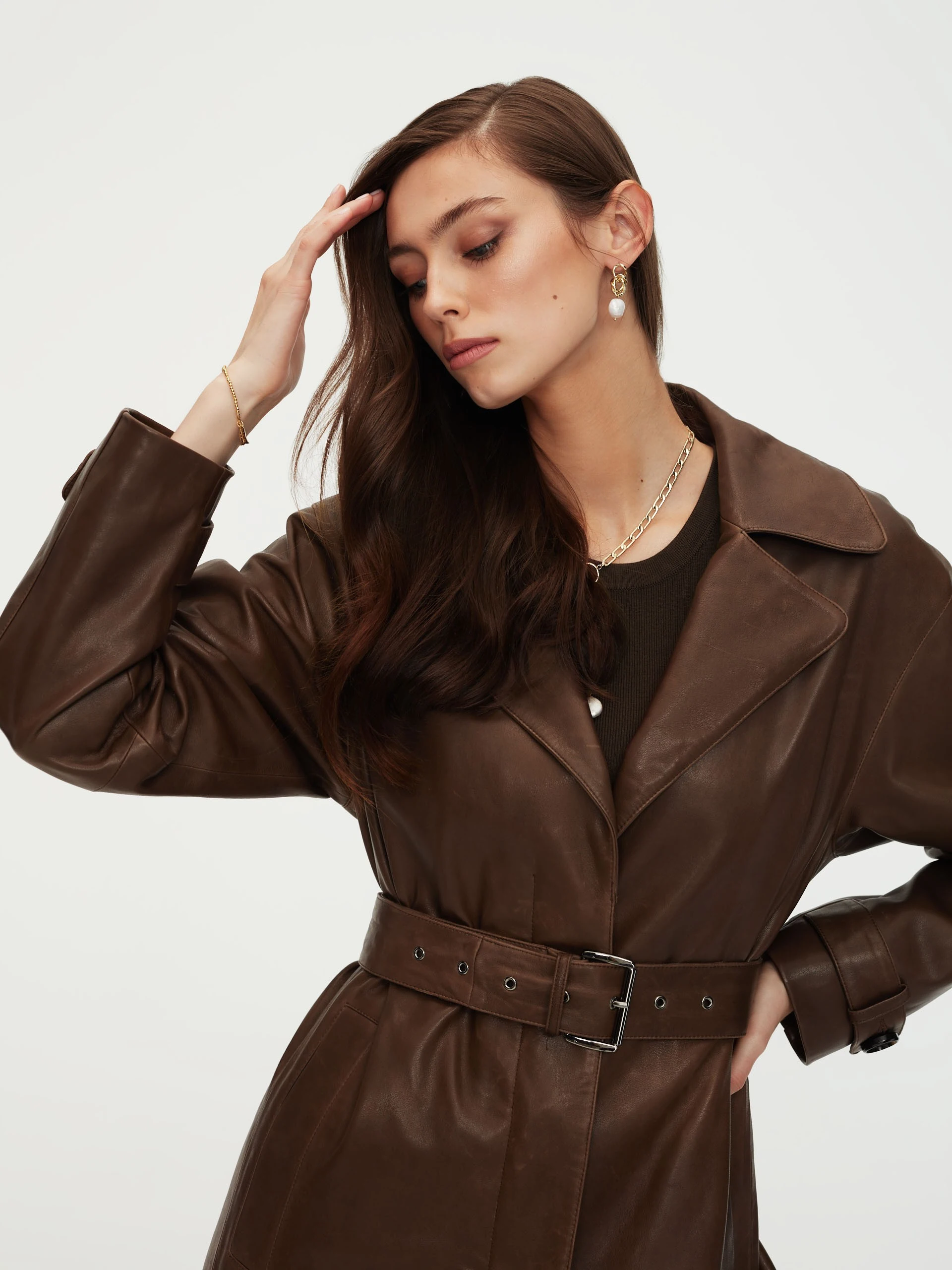 Leather coat in brown color