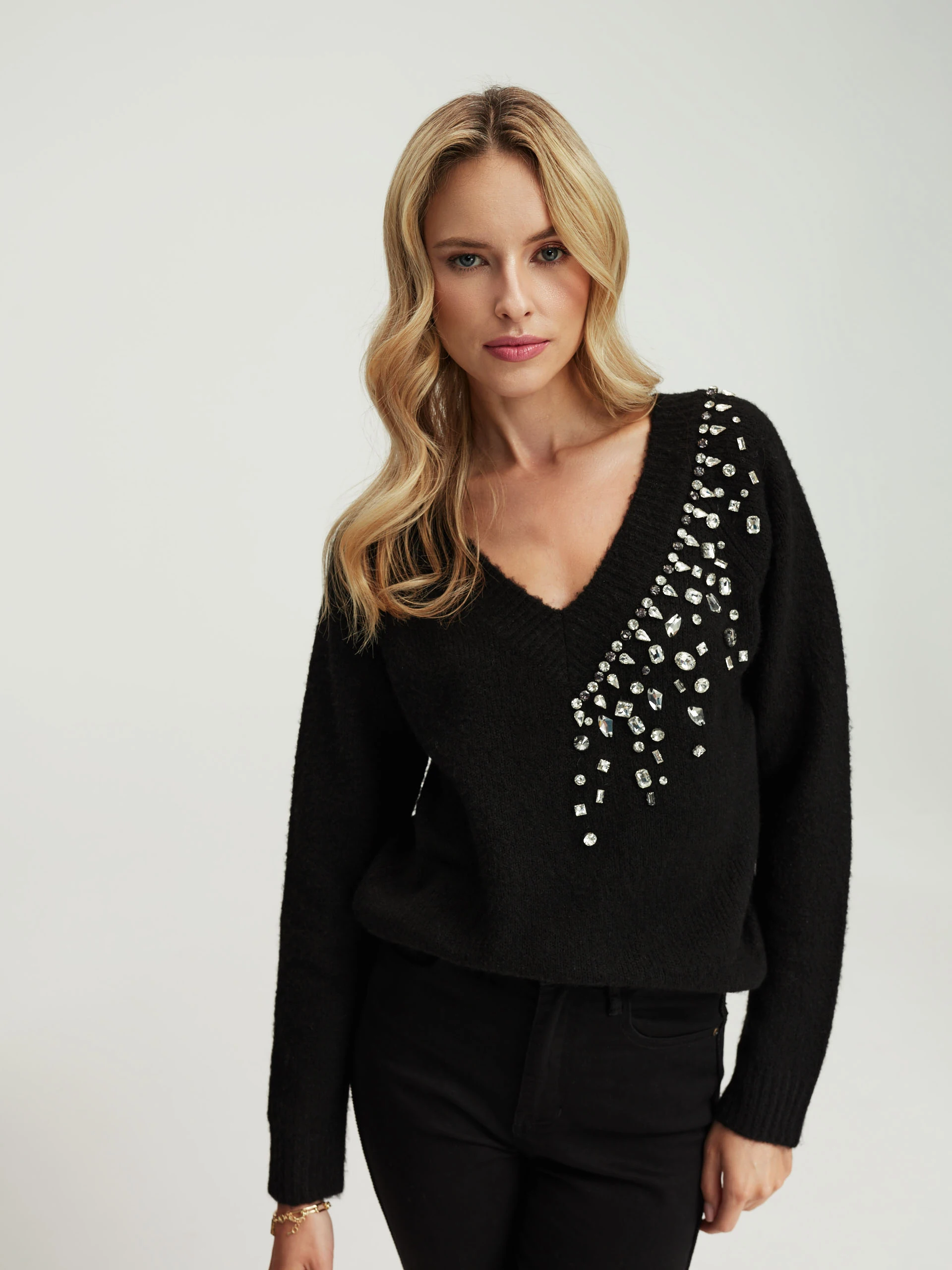 Black sweater with ornaments