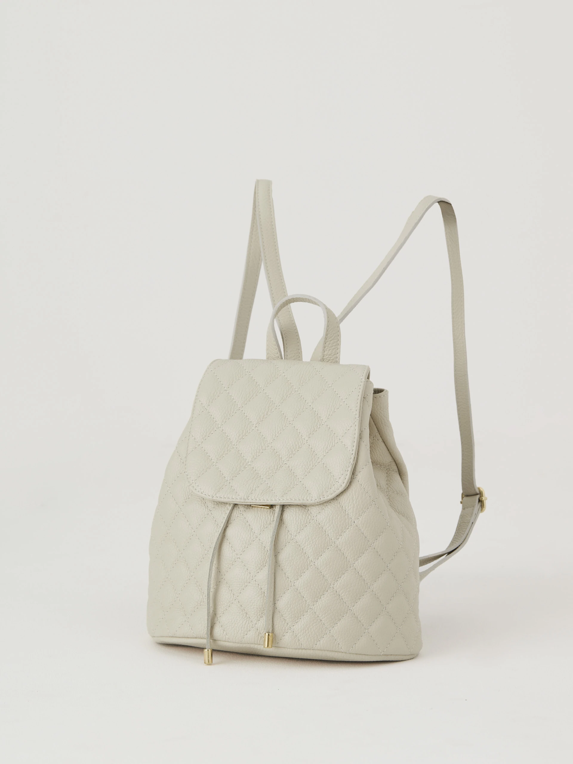 Cream quilted leather backpack