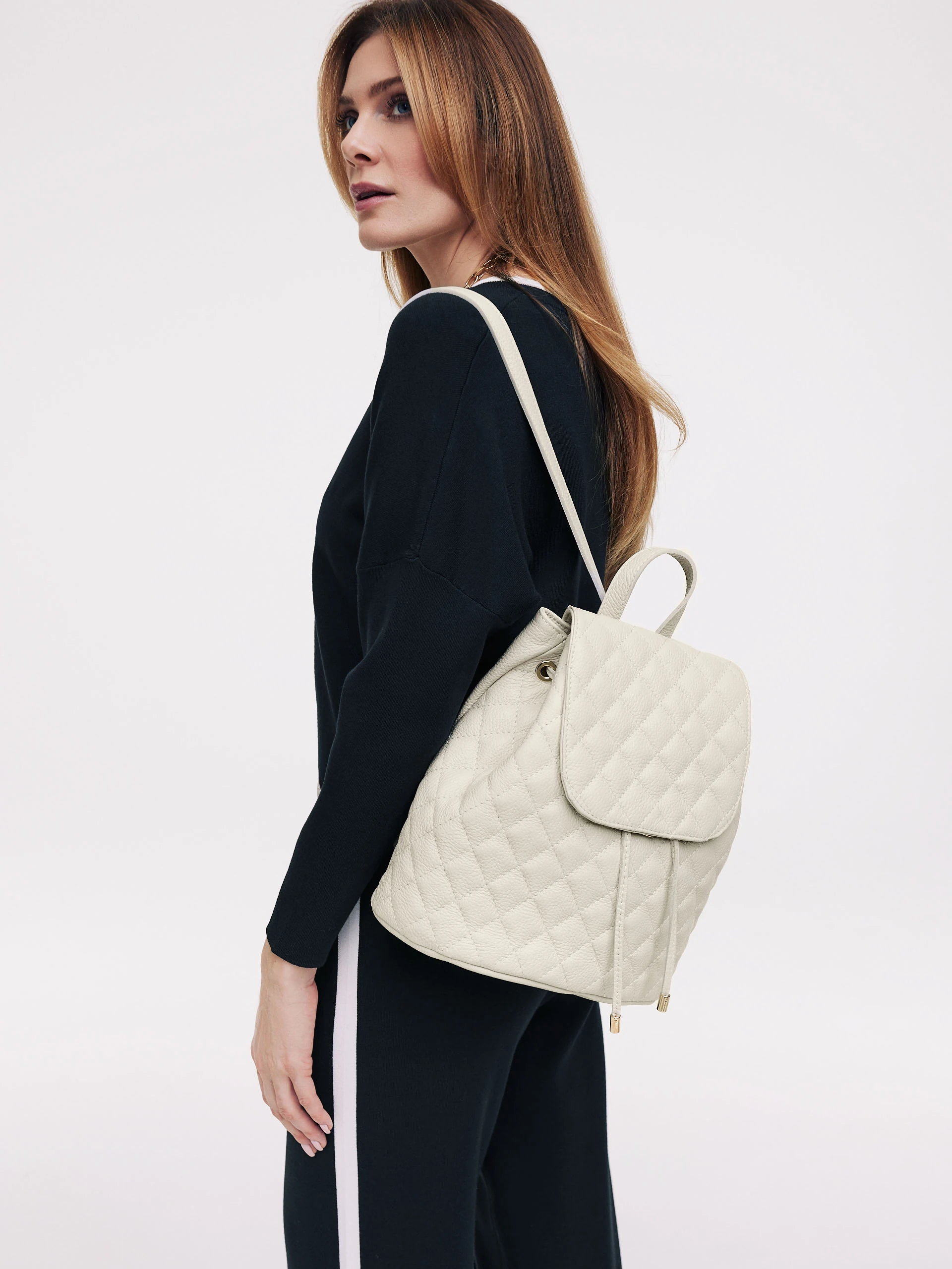 Cream quilted leather backpack