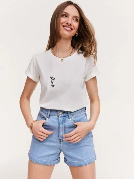 White blouse with short sleeves and inscription
