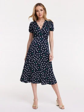 Navy blue dress with white and green peas