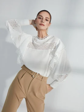 Blouse with lace inserts