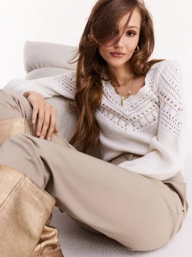 Openwork sweater in a shade of white