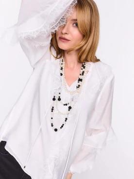 White rayon blouse with lace embellishments