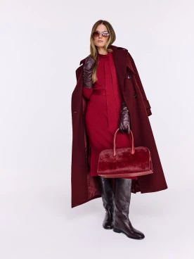 Burgundy knit dress with a tie at the neckline