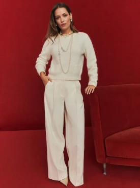 Creamy sweater with pearls and pockets