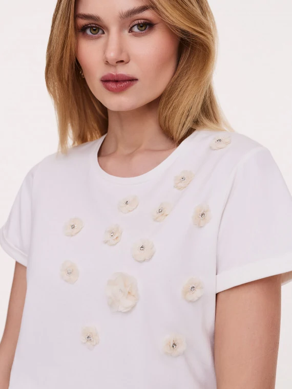 Cotton blouse with flower embellishments