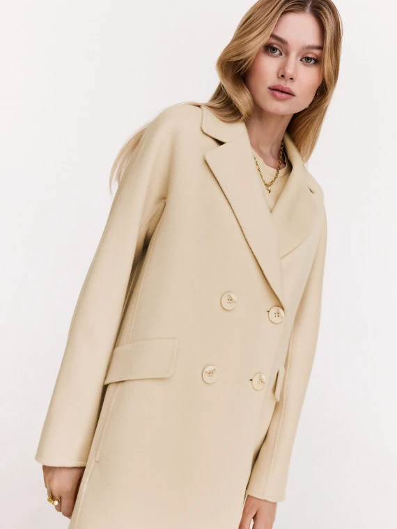 Wool cream coat with a classic cut