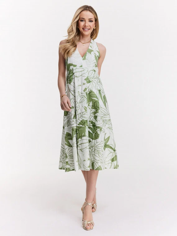 Summer light dress with green leaf pattern