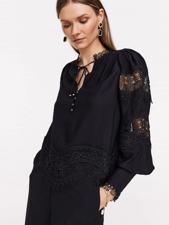 Black openwork blouse with lace and binding