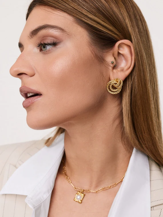 Gold-colored earrings