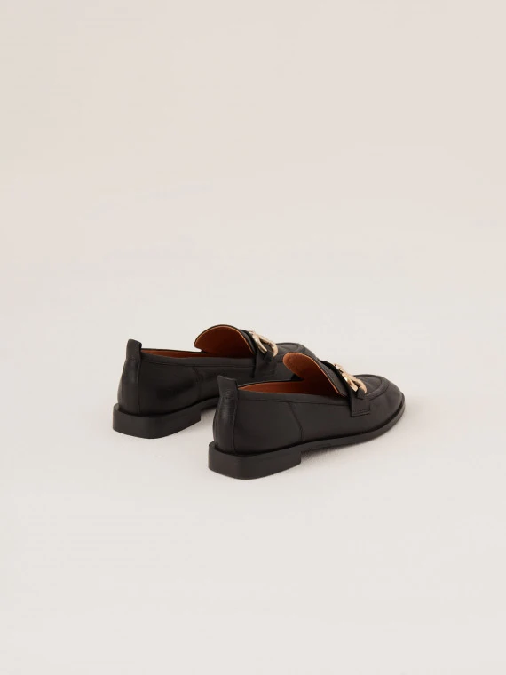 Black leather moccasins with buckles