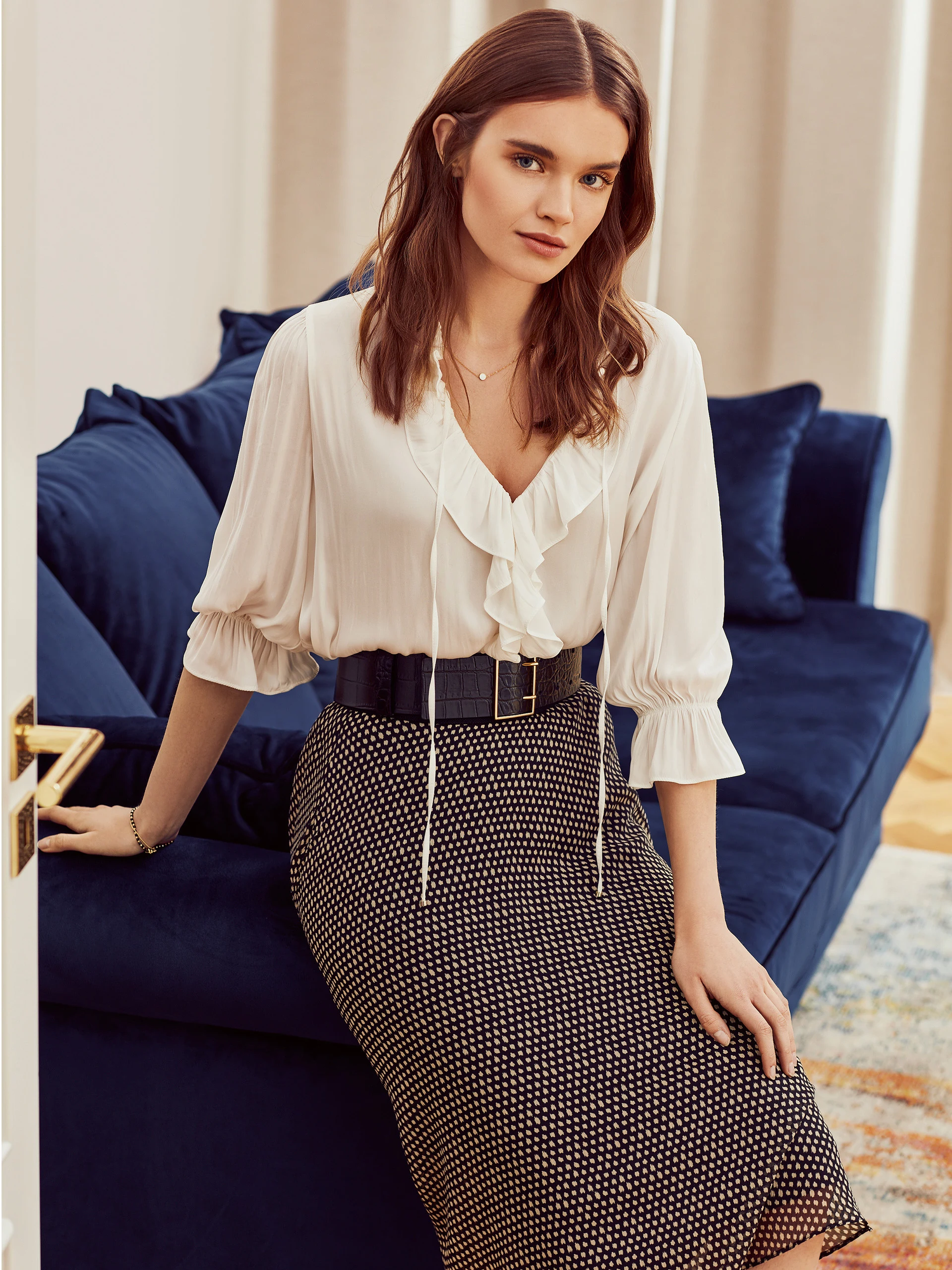 PLEATED SKIRT WITH CHECKERED PATTERN