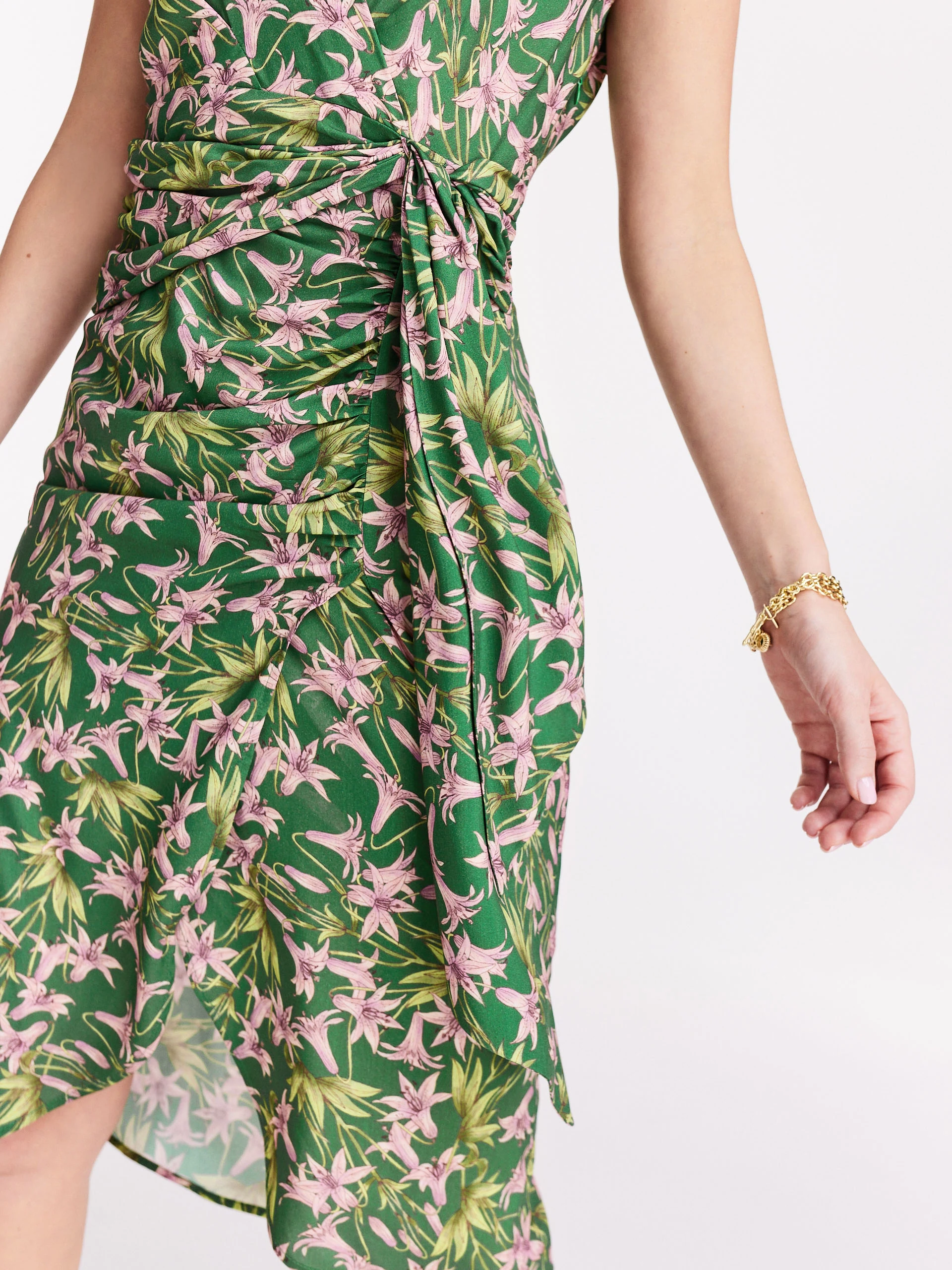 Asymmetrical green dress with exotic flowers