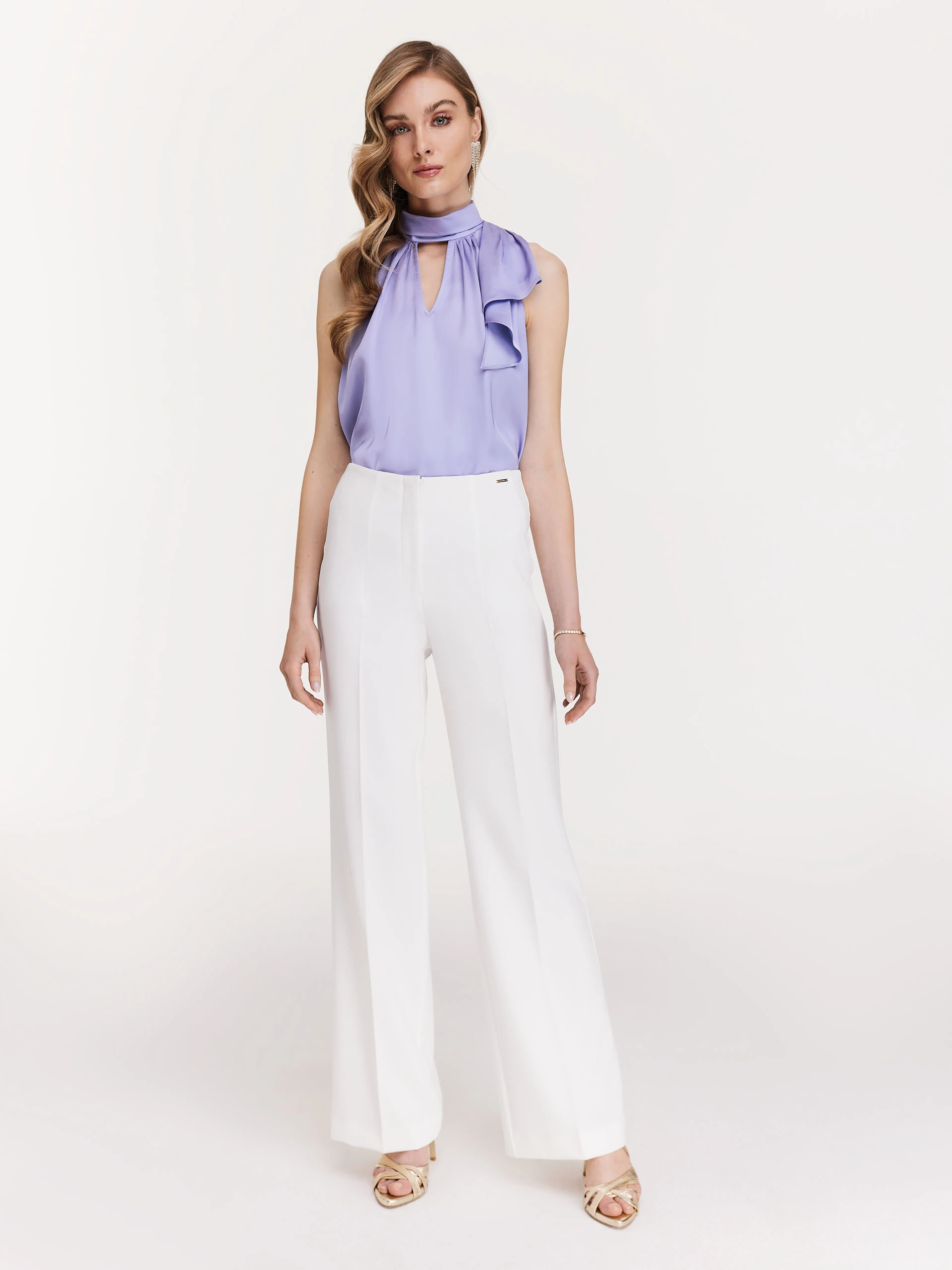 Elegant white pants with flared legs