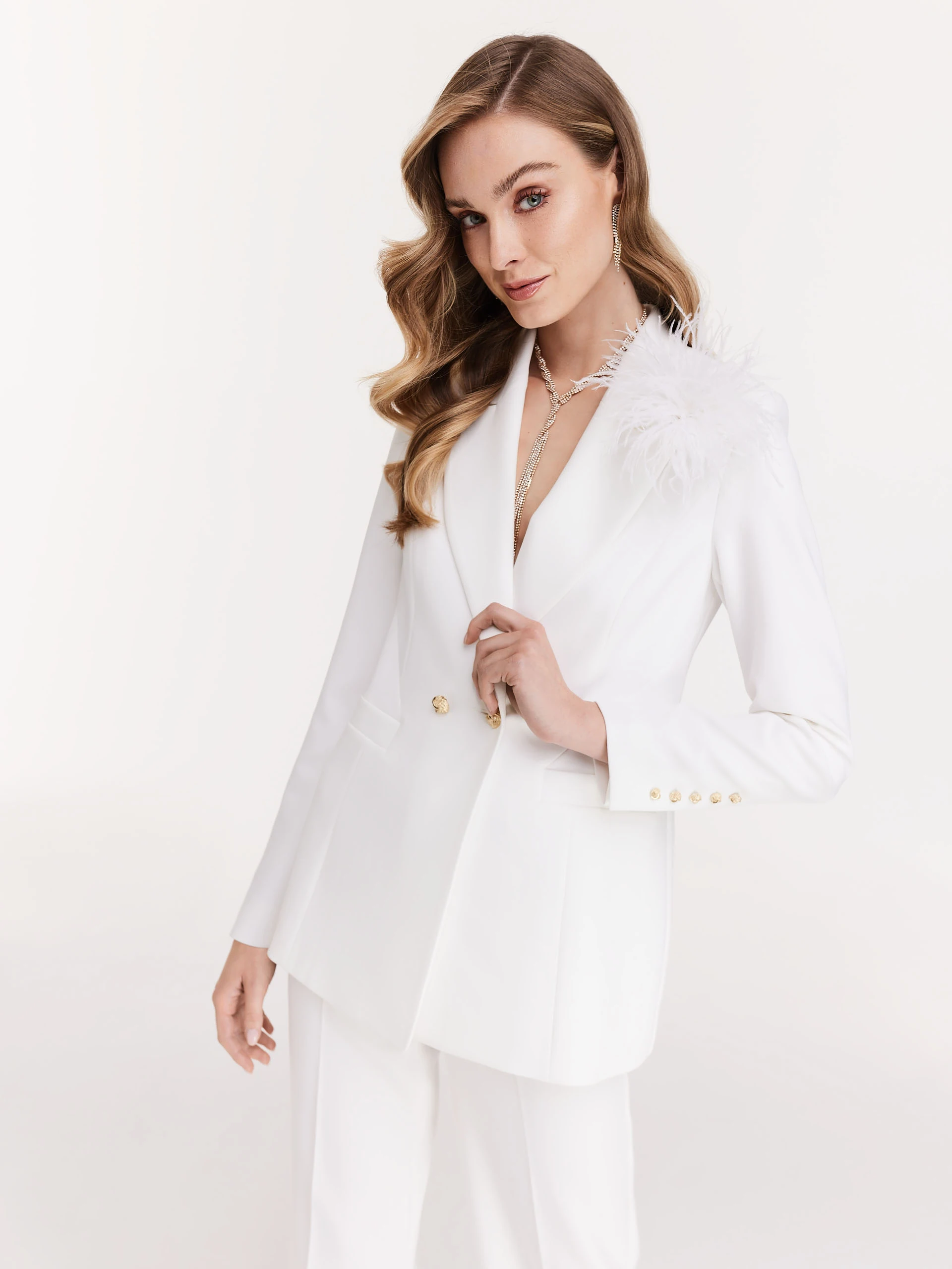 Elegant white jacket with decorative buttons