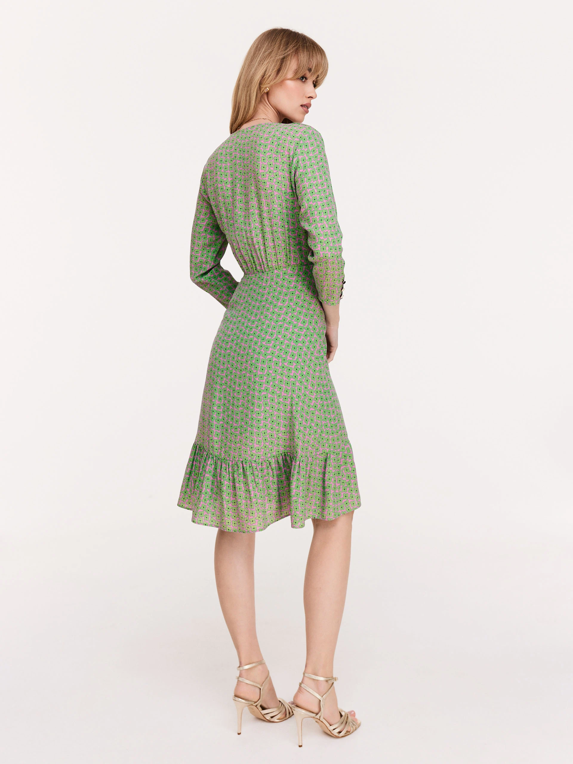 Asymmetrical pink dress with green flowers