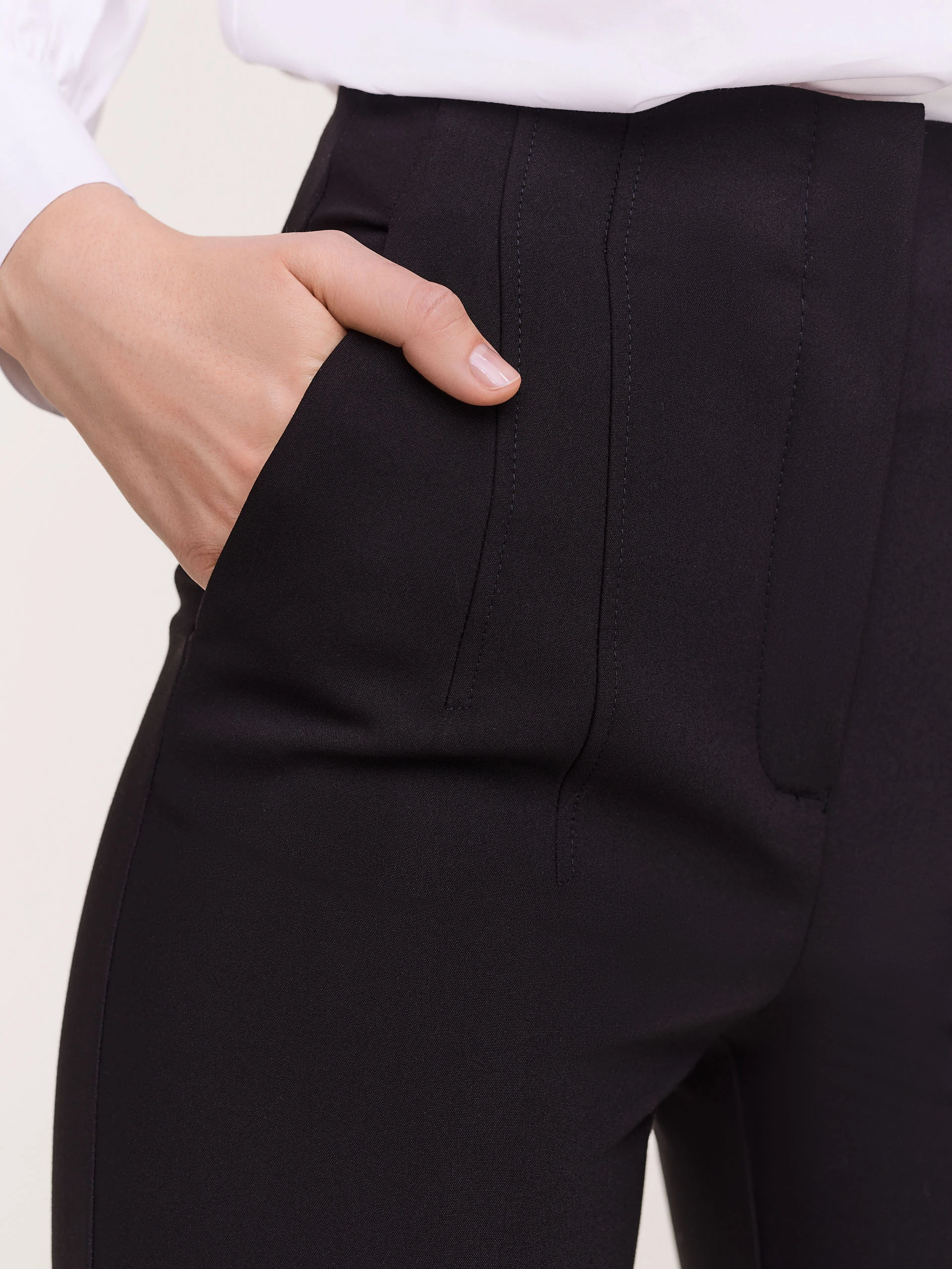 Fitted black high-waisted cigarette pants