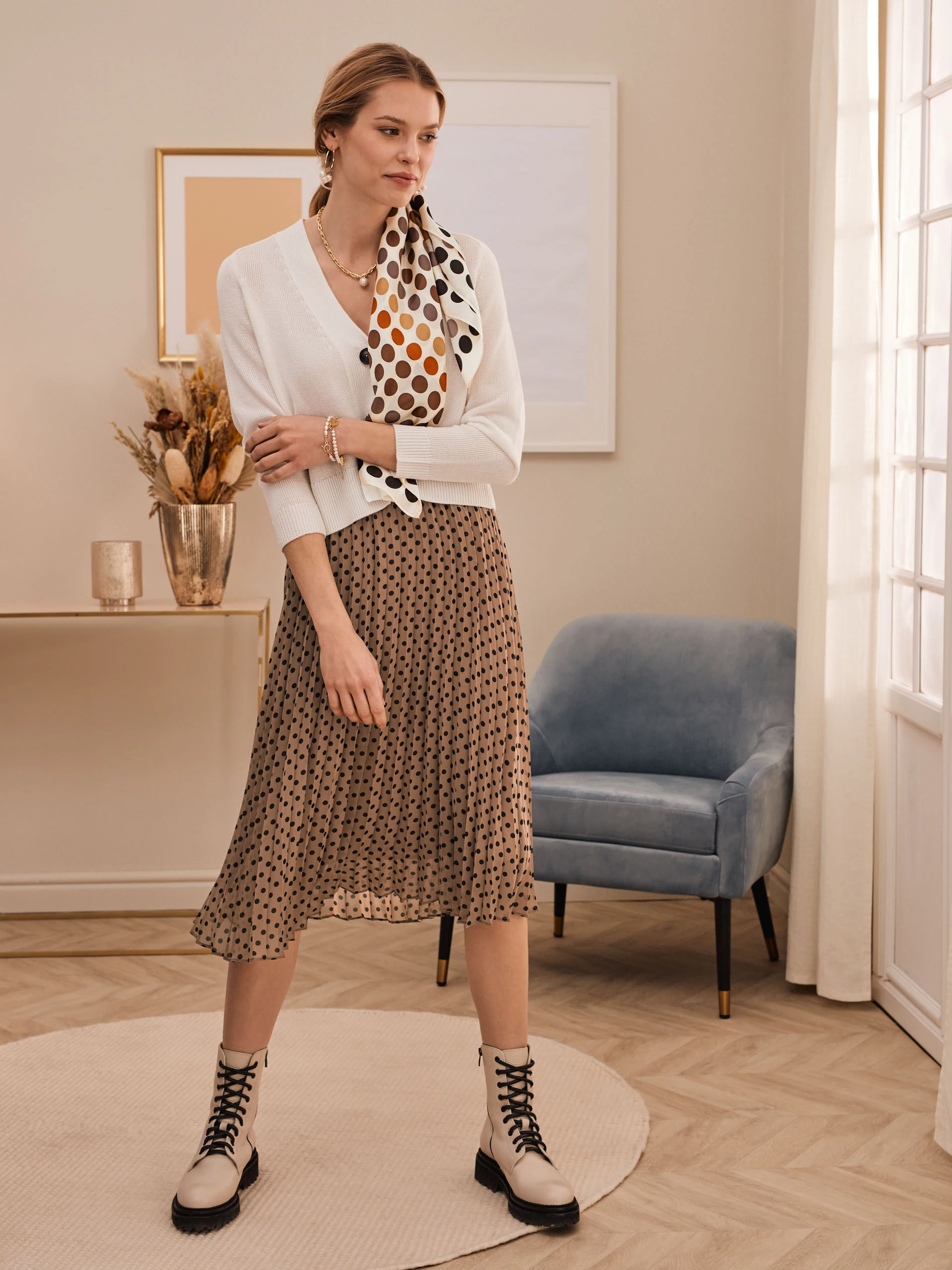 PLEATED SKIRT WITH PEAS