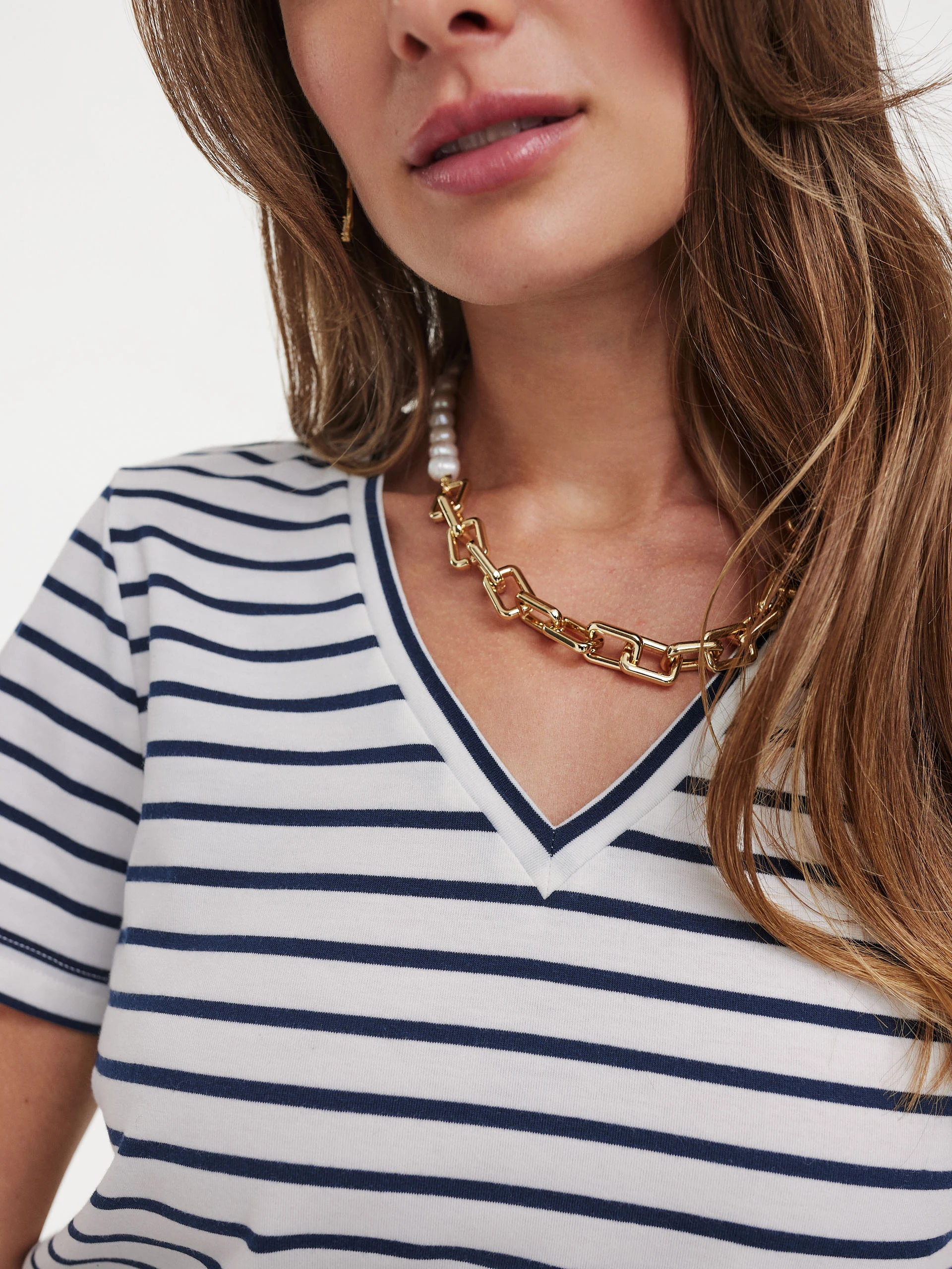 White T-shirt with navy blue stripes