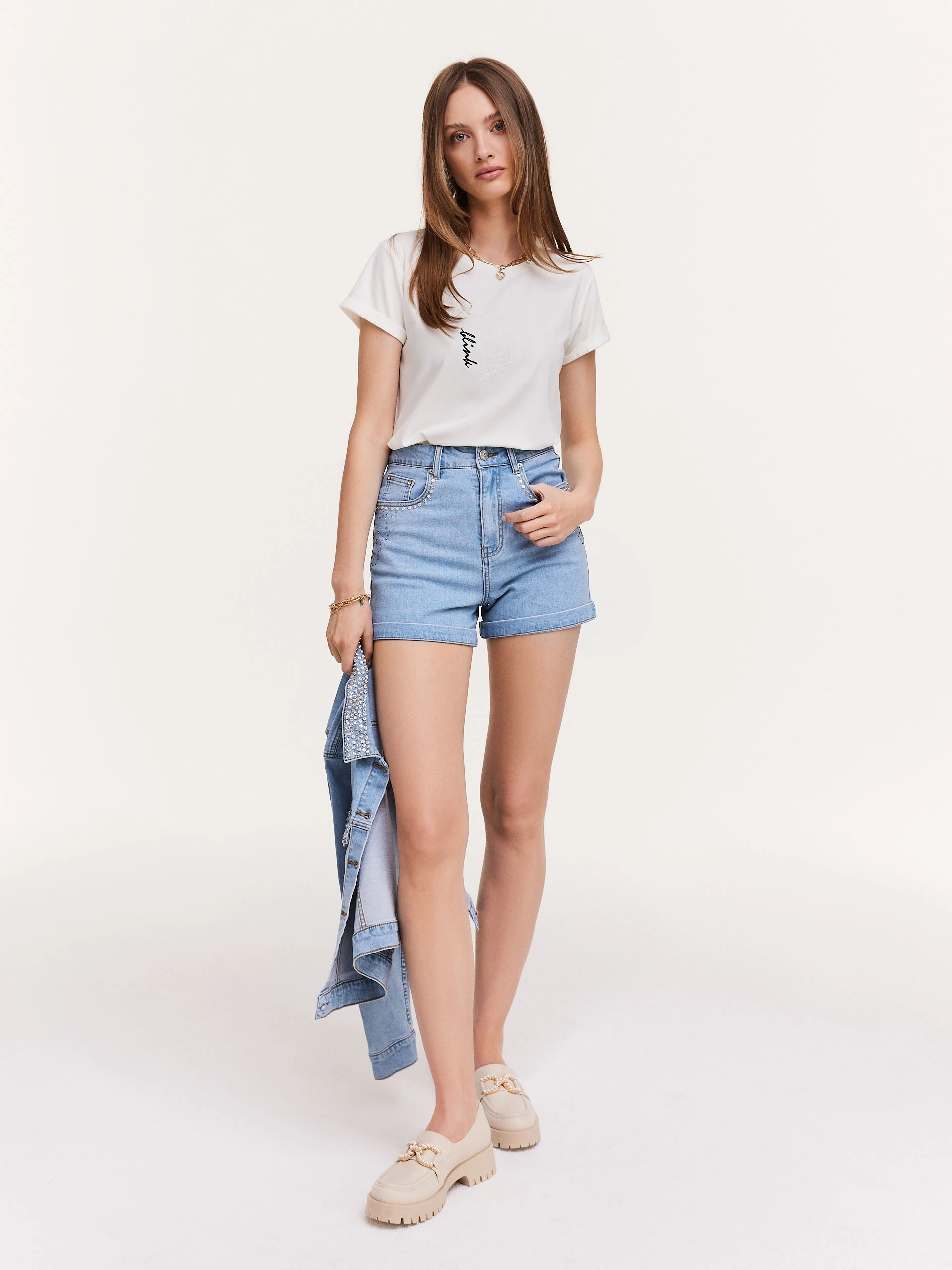White blouse with short sleeves and inscription