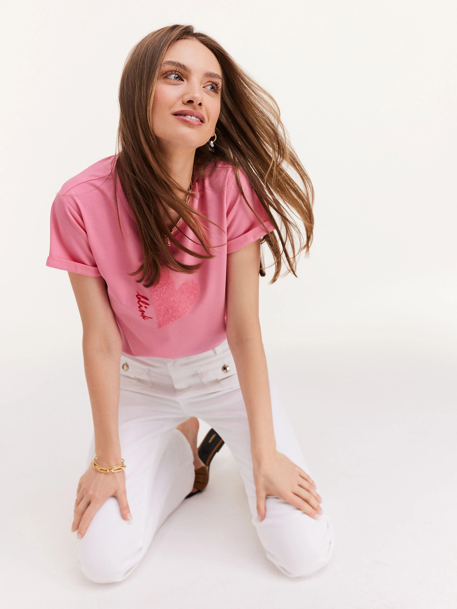 Pink blouse with short sleeves and inscription