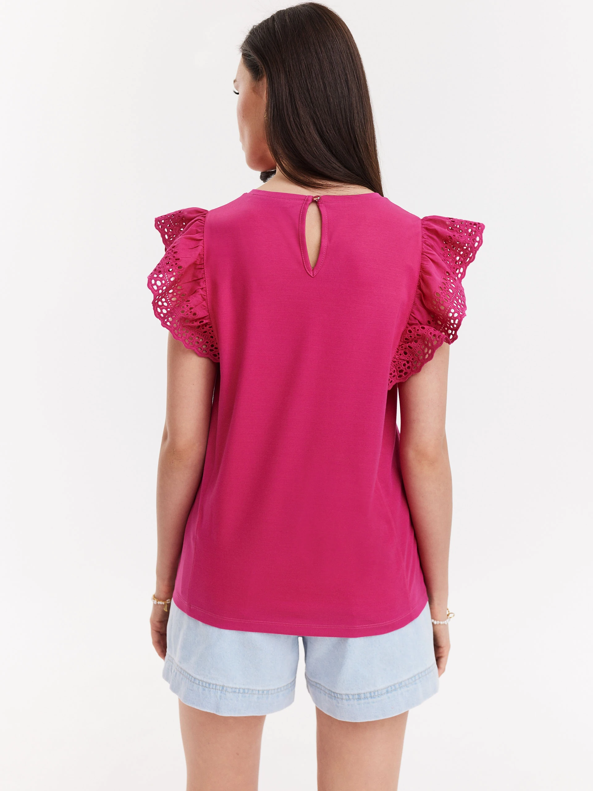 Pink blouse with openwork inserts