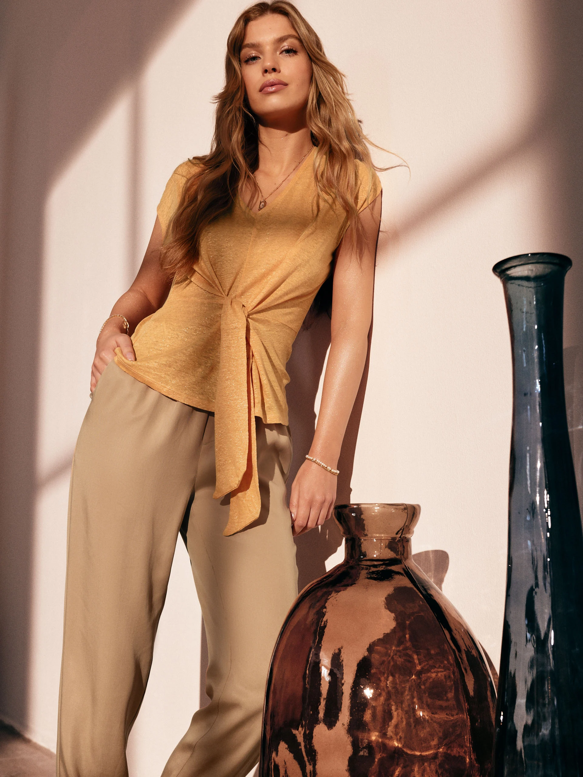 Orange linen blouse with shimmering threads