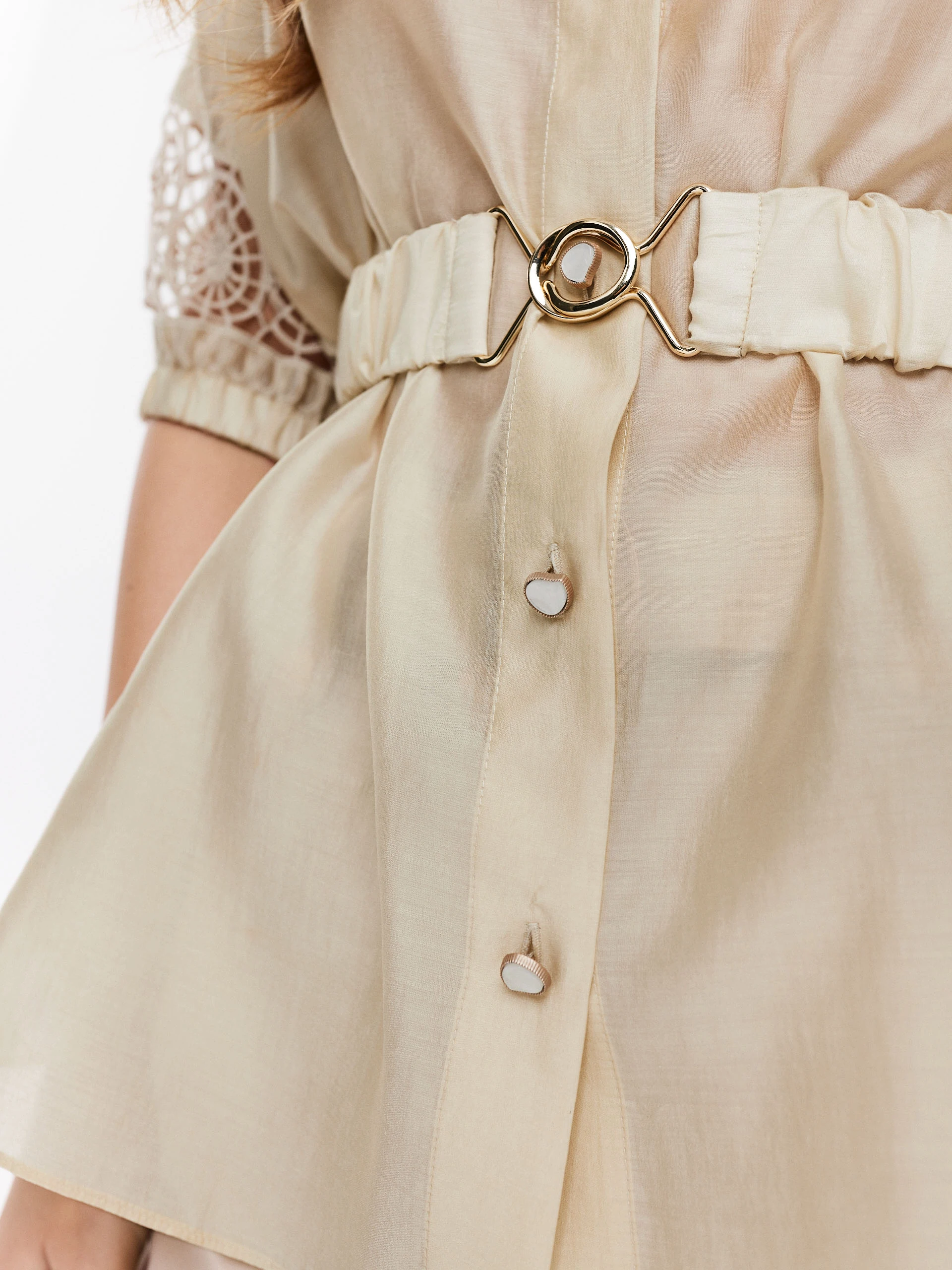 Beige shirt with openwork inserts