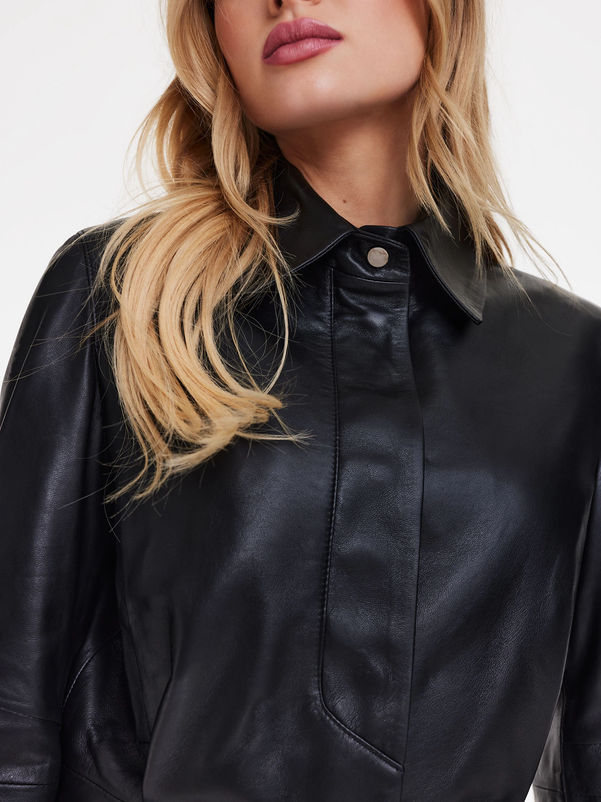 Short leather jacket in black color