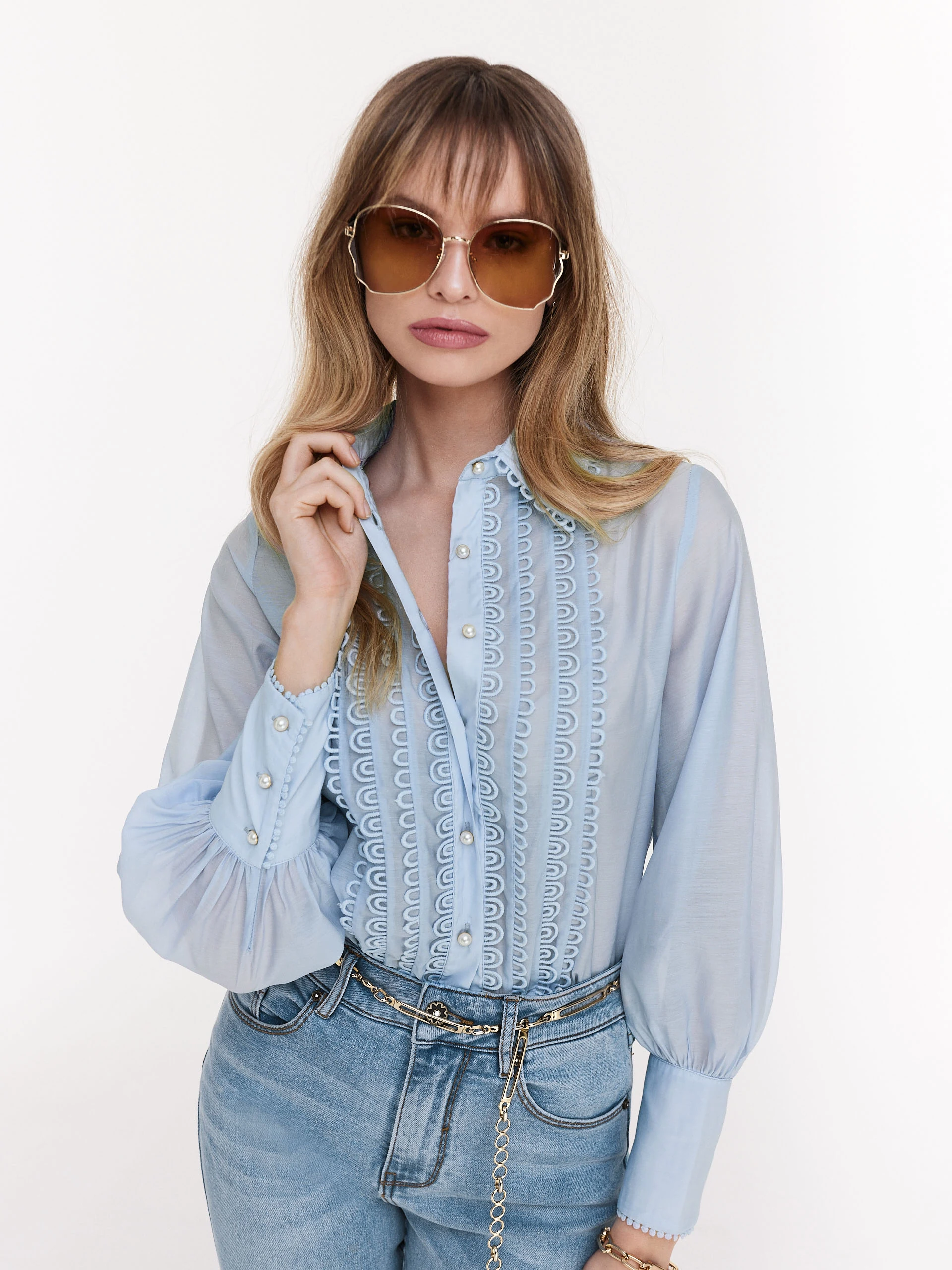 Blue shirt with decorative stitching