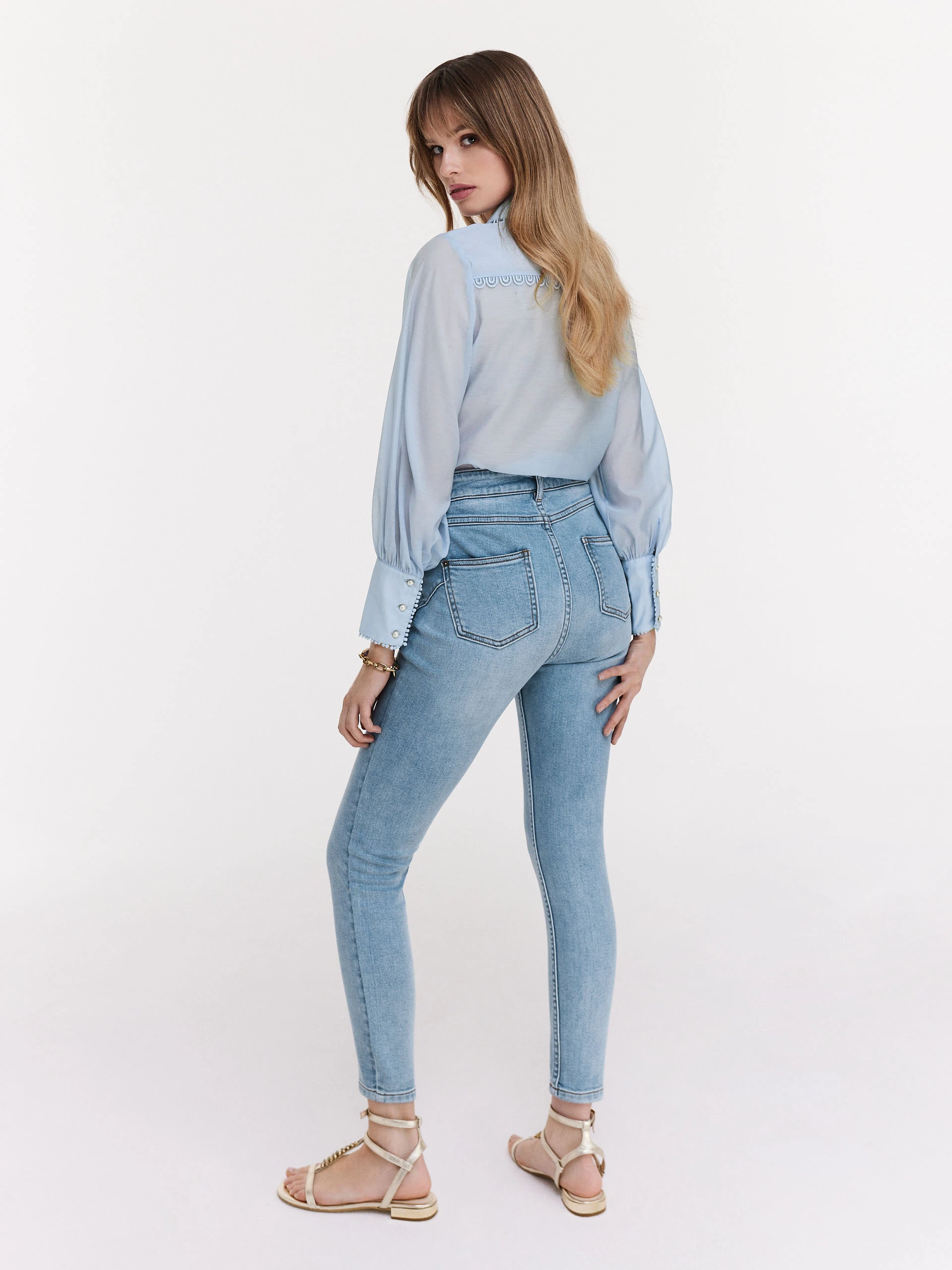 Blue shirt with decorative stitching