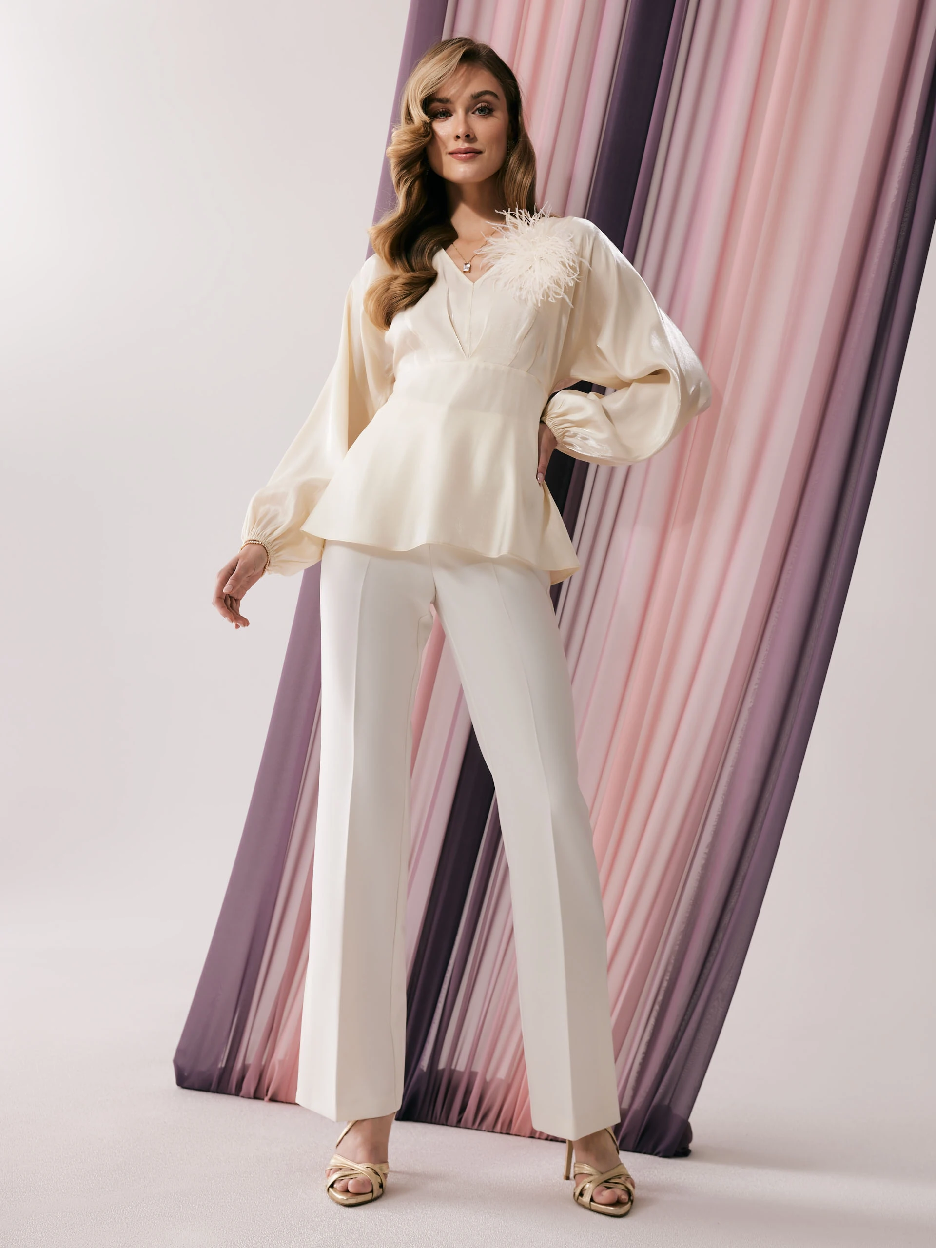 White pants with canted legs