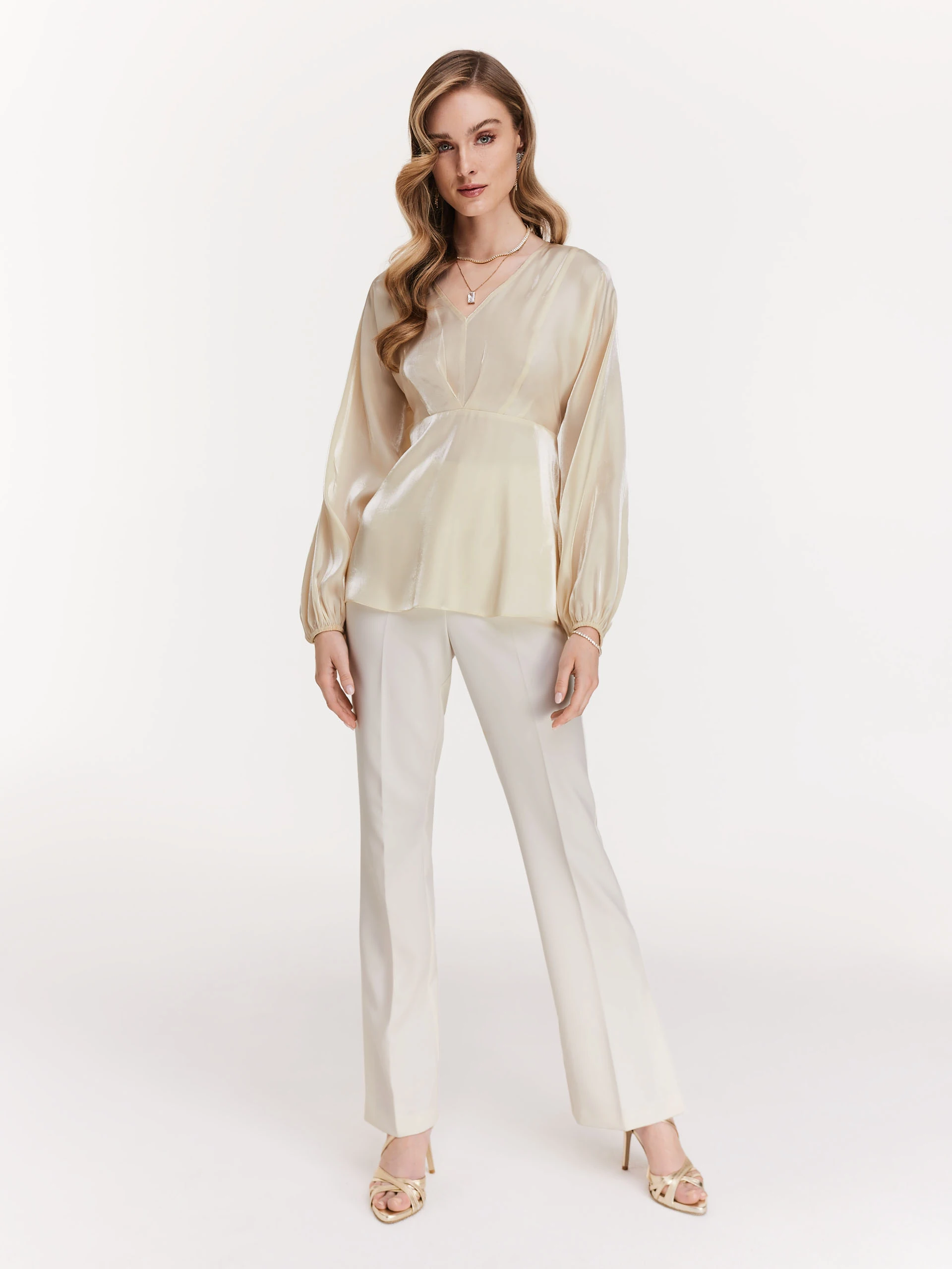 White pants with canted legs