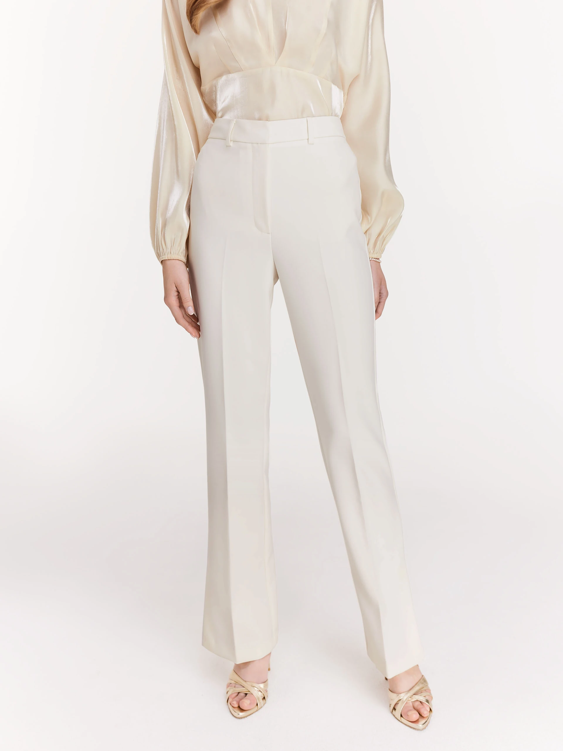White pants with canted legs