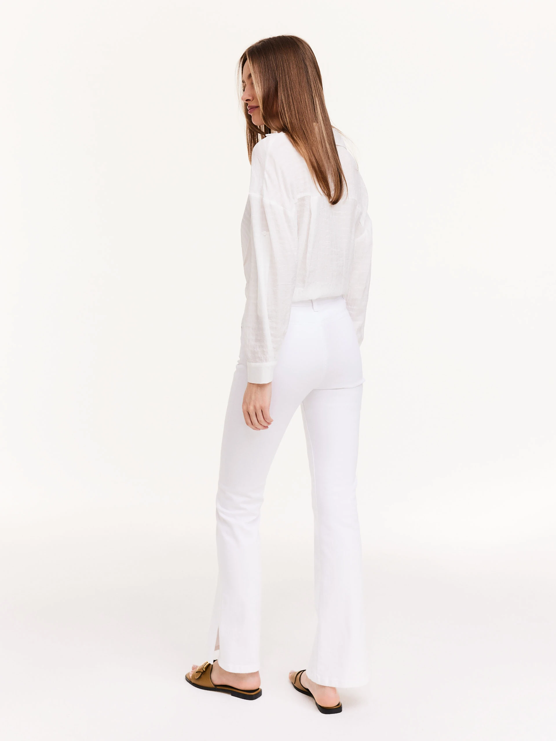 White pants with flared legs