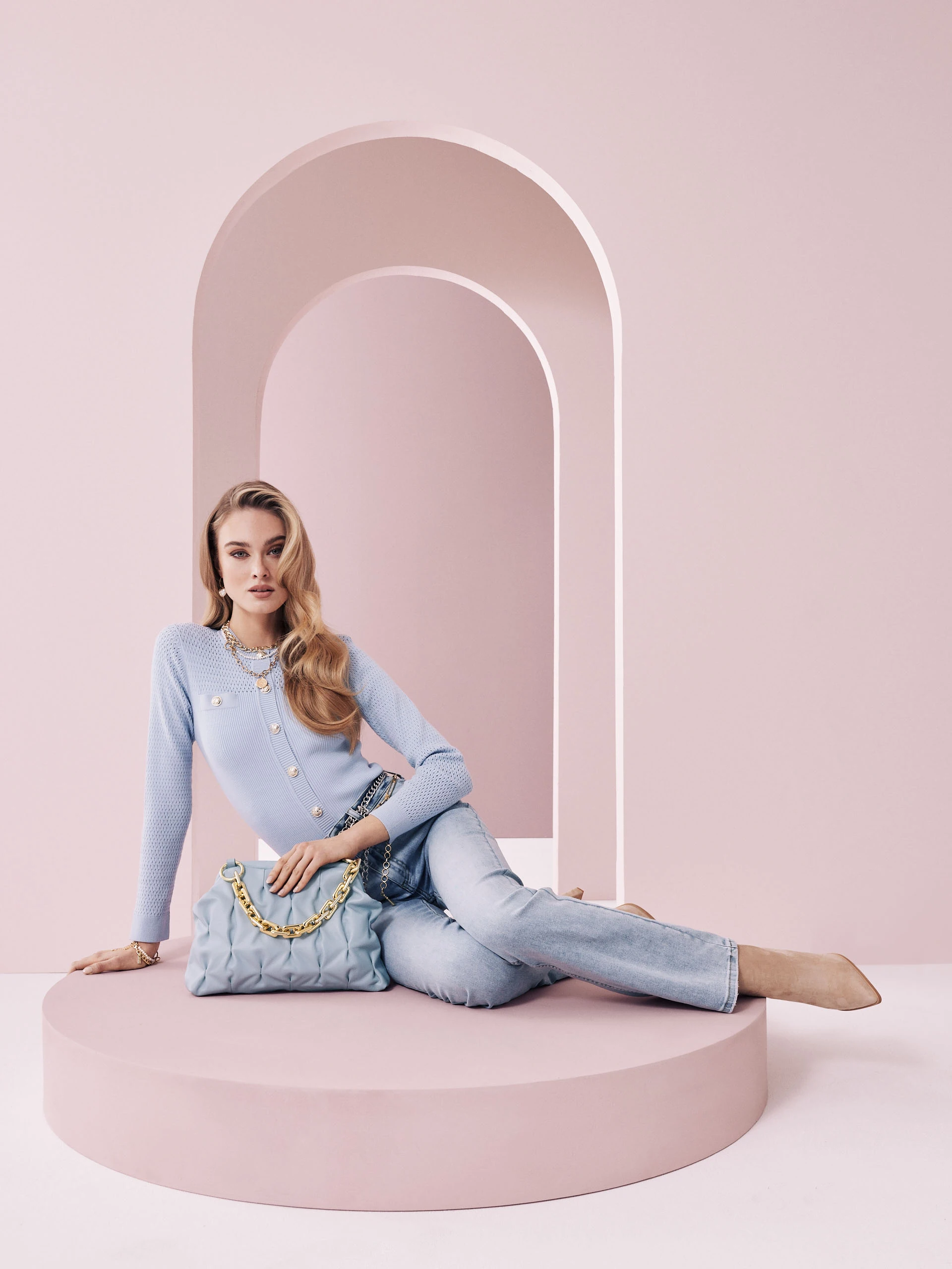 Blue sweater fastened with buttons
