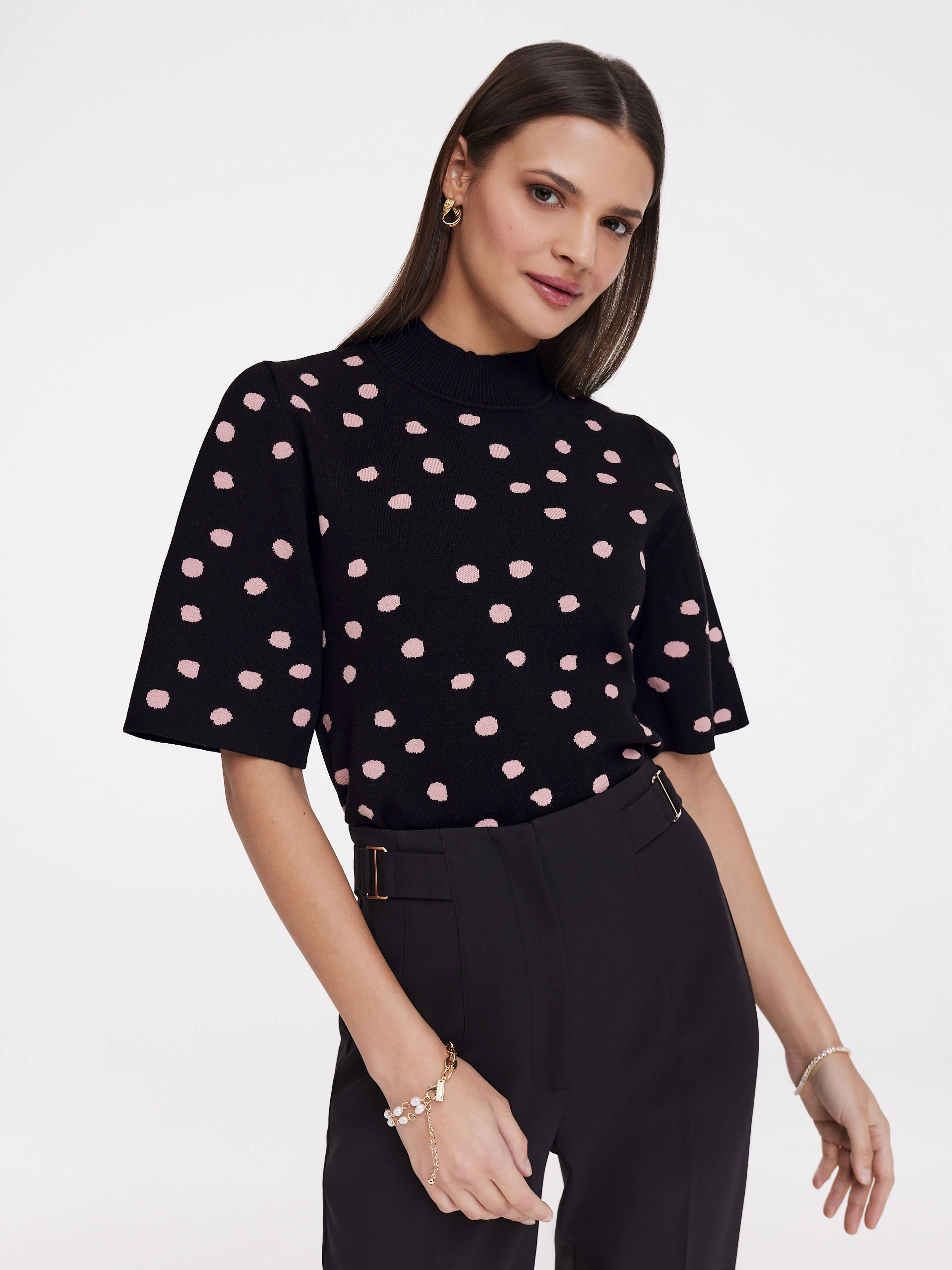 Black sweater with peas
