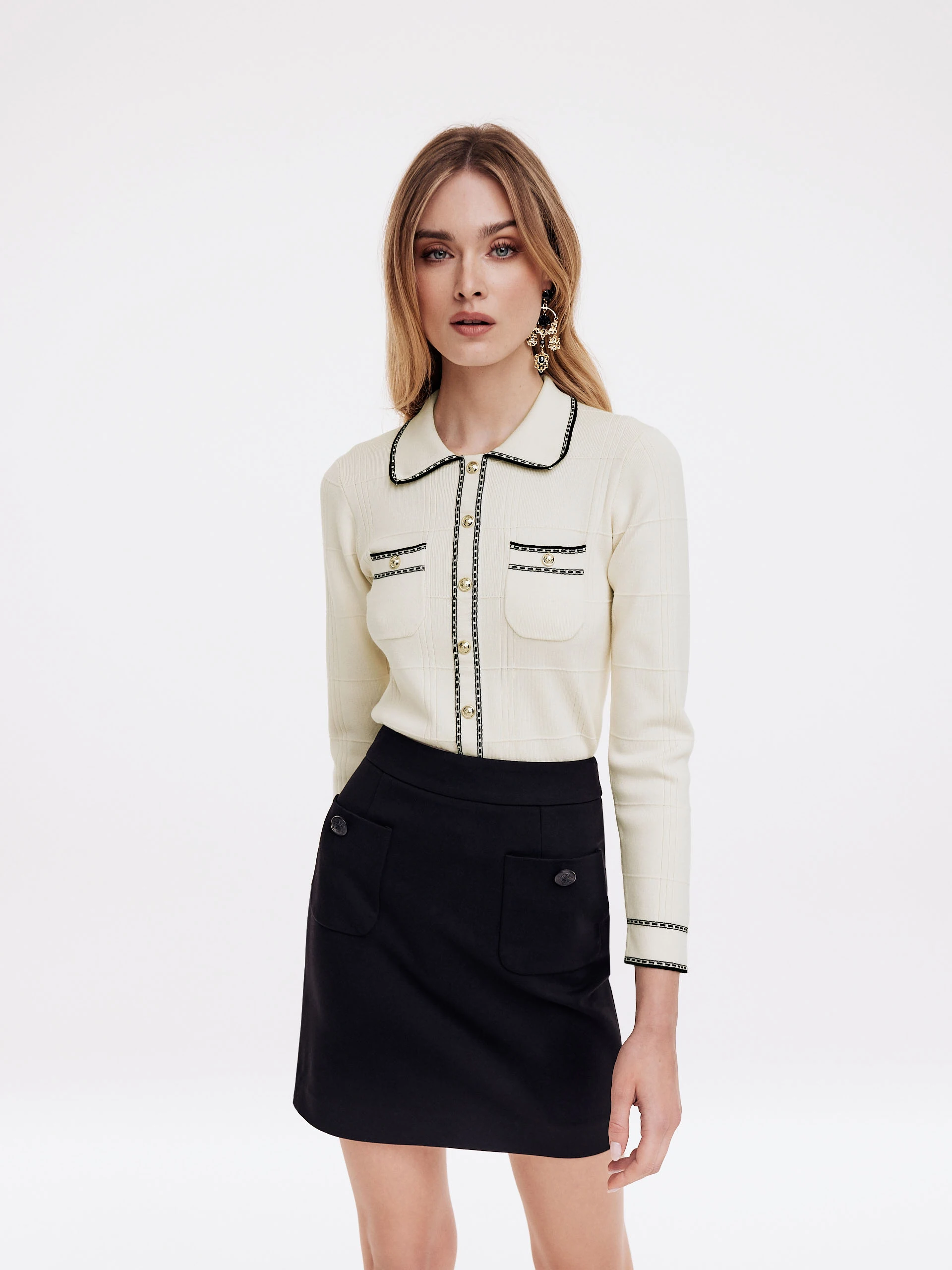 White sweater with collar and buttons