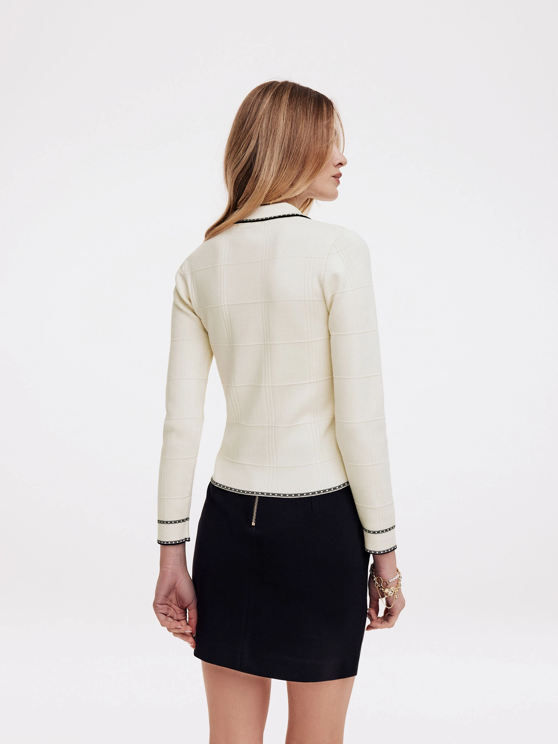 White sweater with collar and buttons