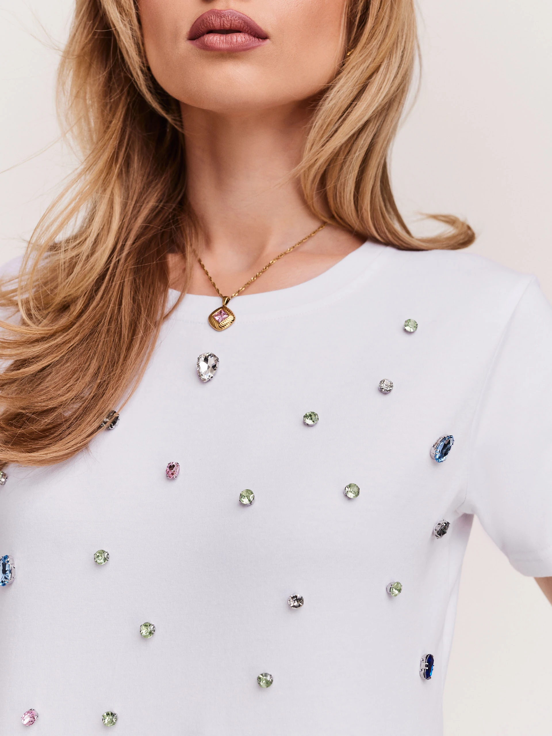 White cotton blouse decorated with crystals