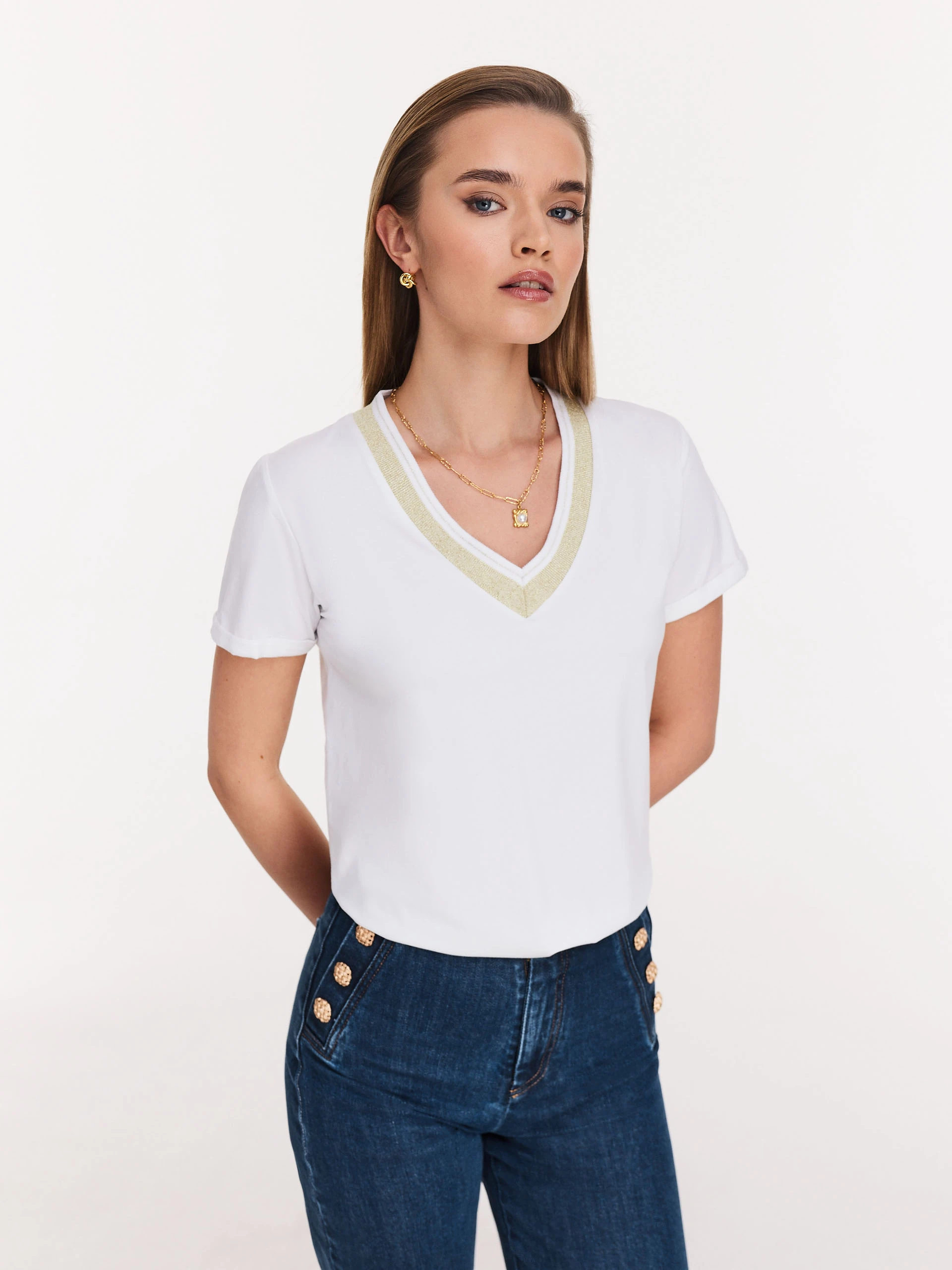 White blouse with piping and short sleeves
