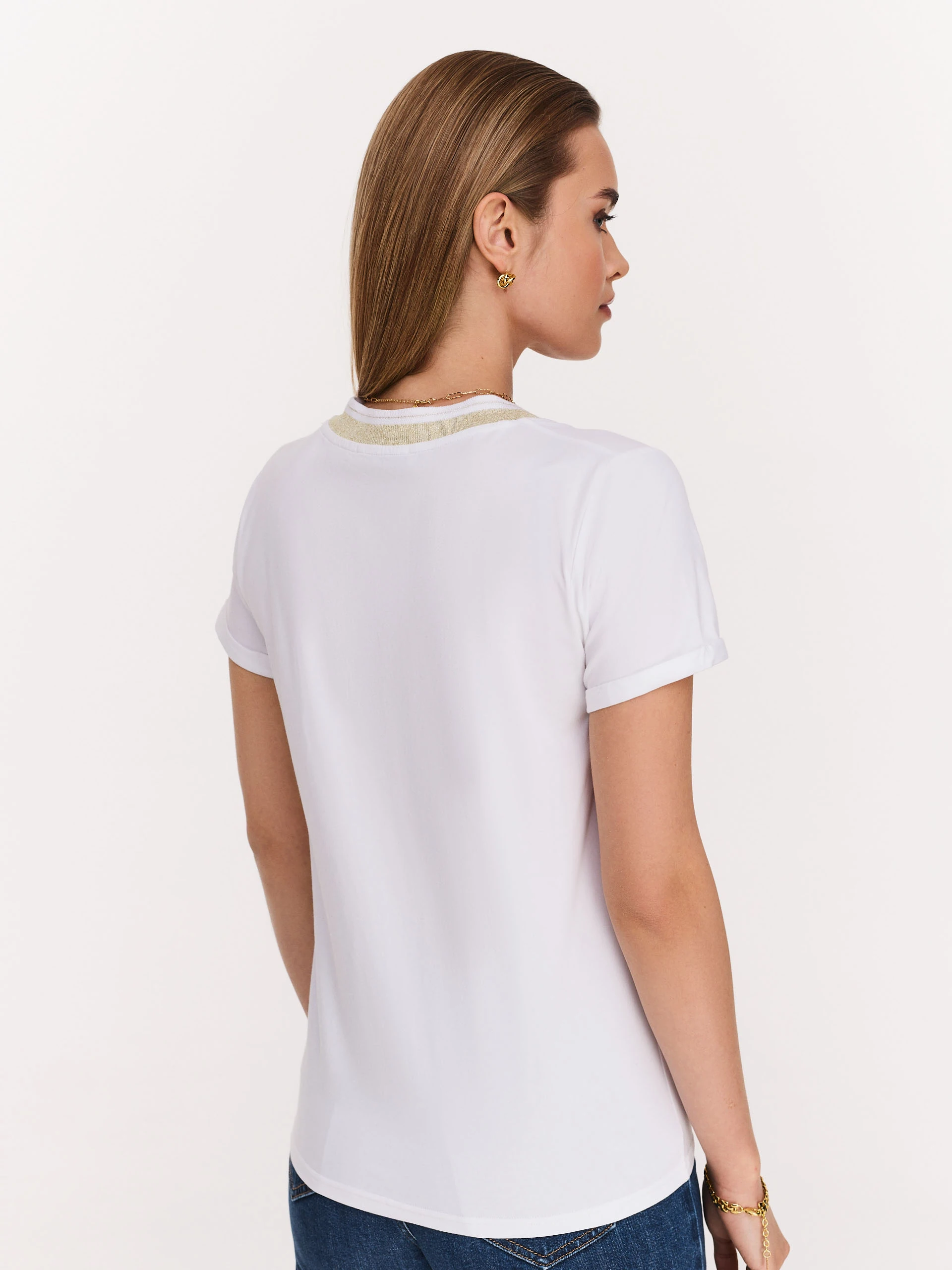 White blouse with piping and short sleeves
