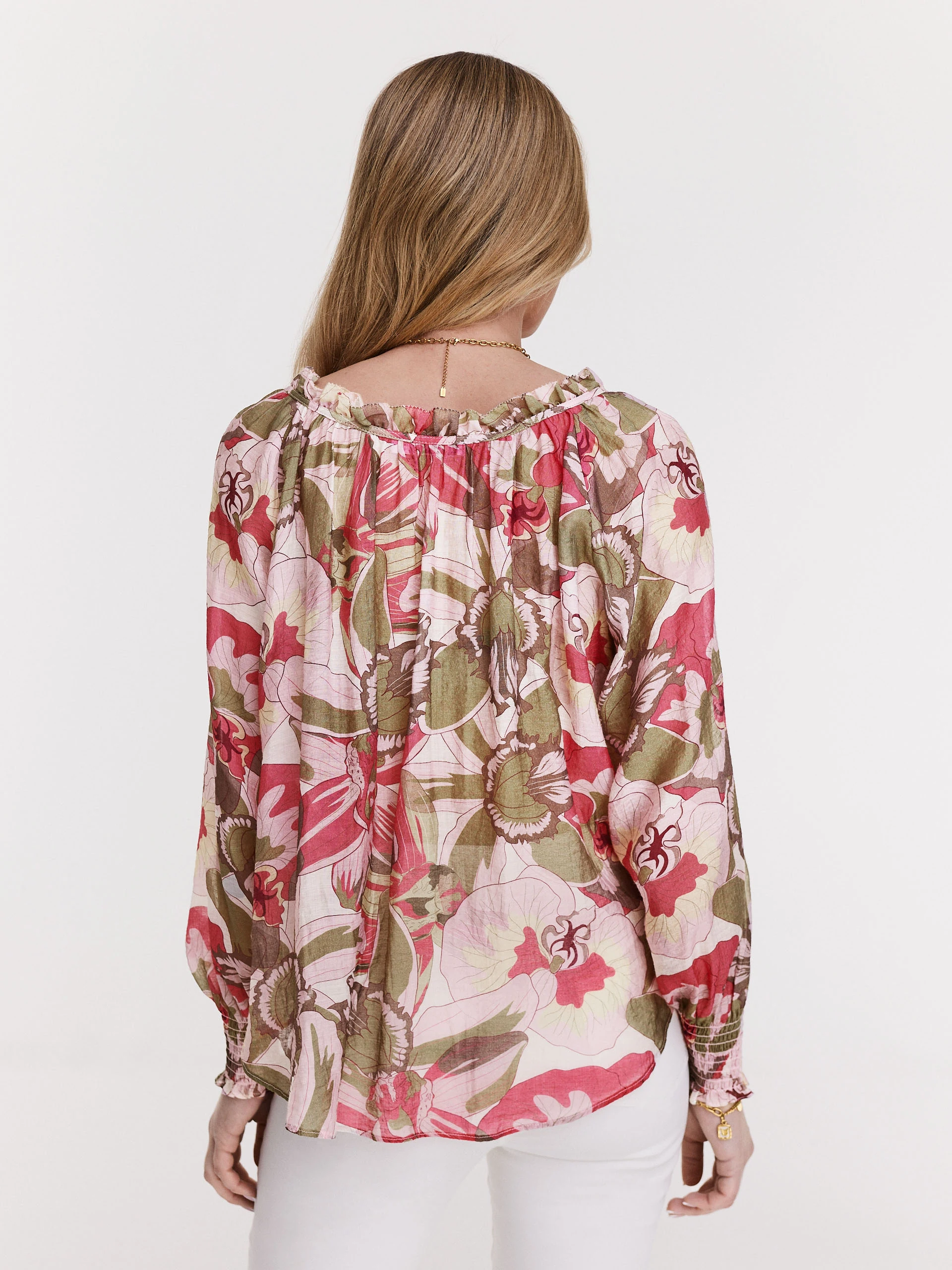 Pink blouse with floral pattern